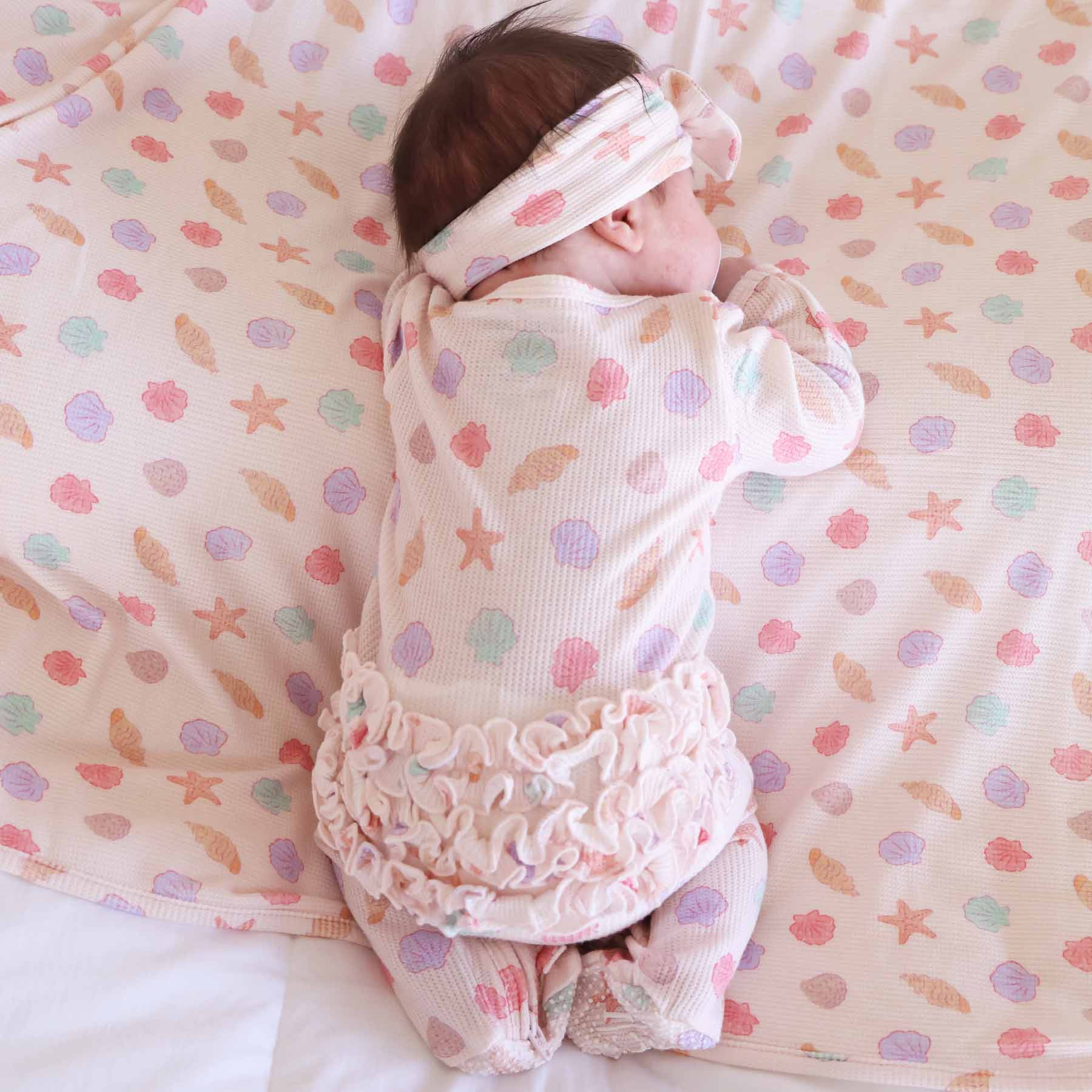 Saltwater Shells Bamboo Waffle Ruffle Zipper Footie | Caden Lane