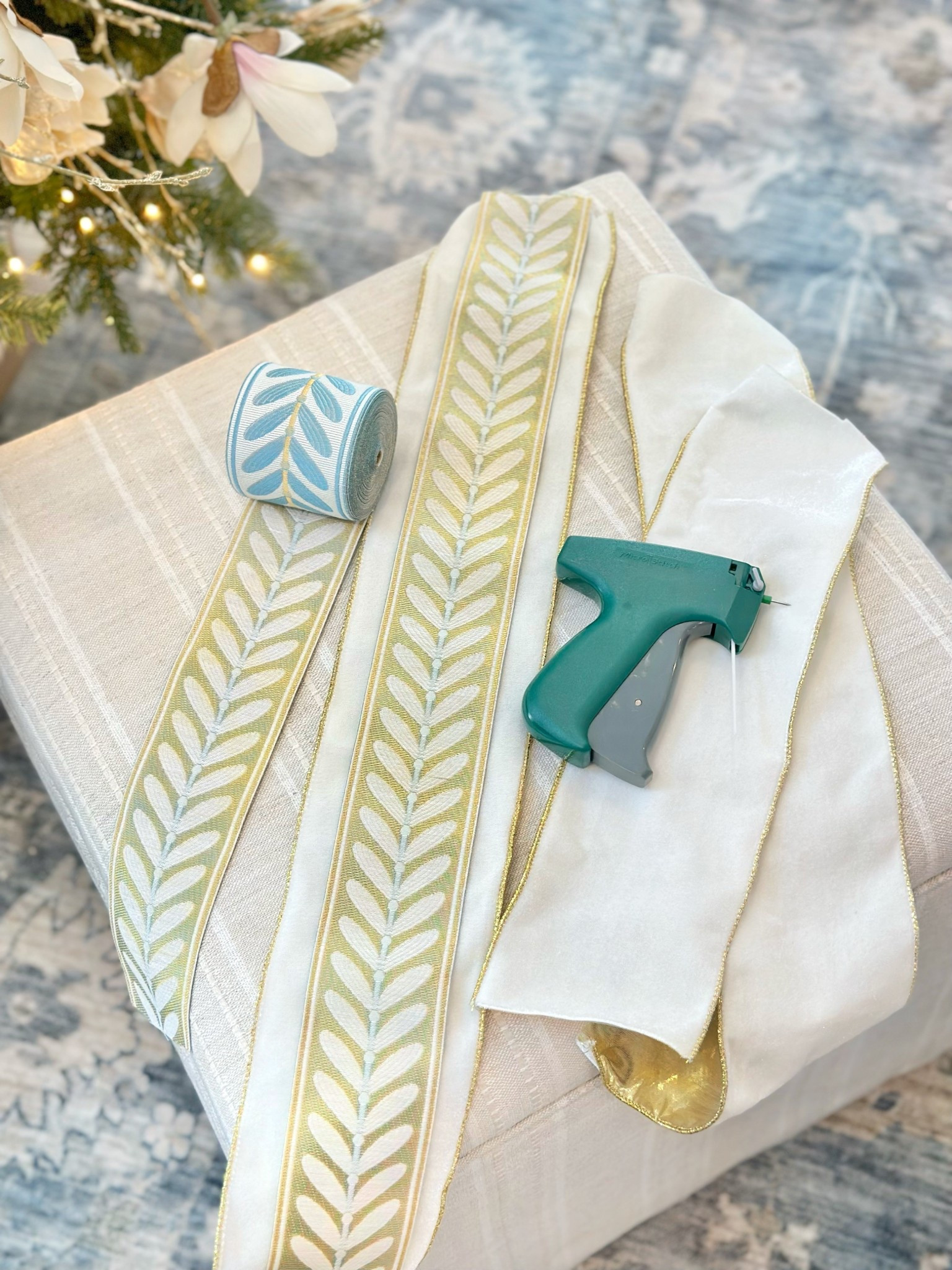 ✨ Ribbon hack alert! ✨use a tagger to attach fabric trim to wired ribbon — no glue, no sewing, just click-click done! 

#LTKHoliday #LTKHome #LTKSaleAlert