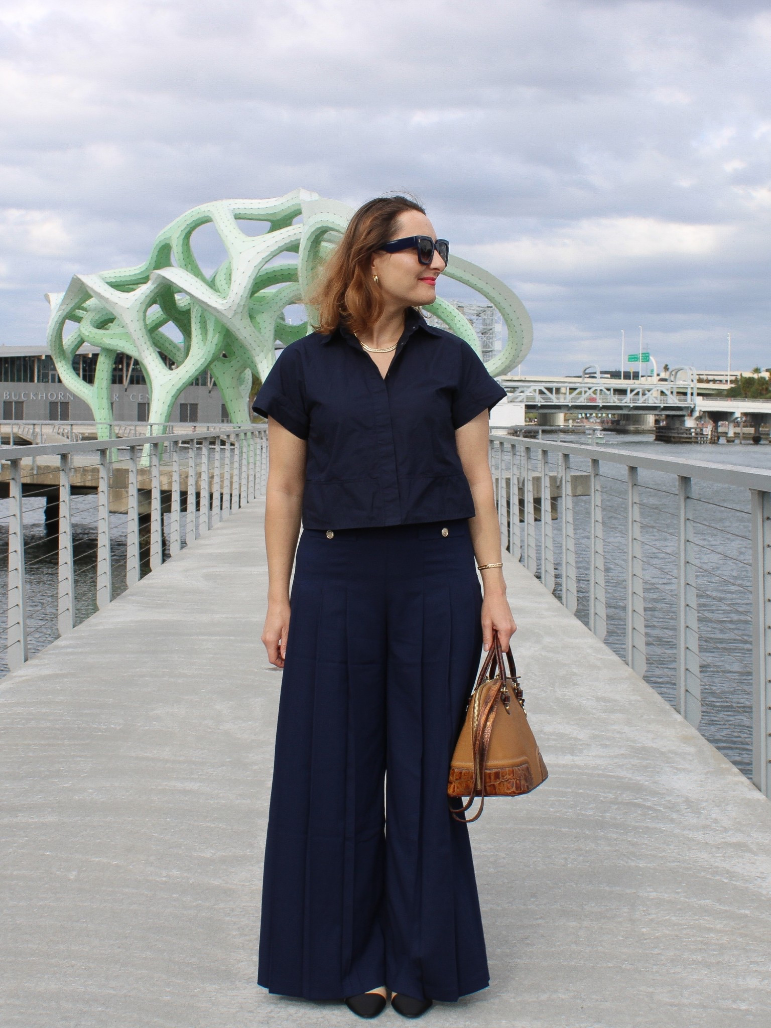 These wide leg pleated pants are under $30 today, with free shipping! They run a tad large, size down if in between sizes. They’re so good! 

Bag is vintage. Shirt is sold out. 
