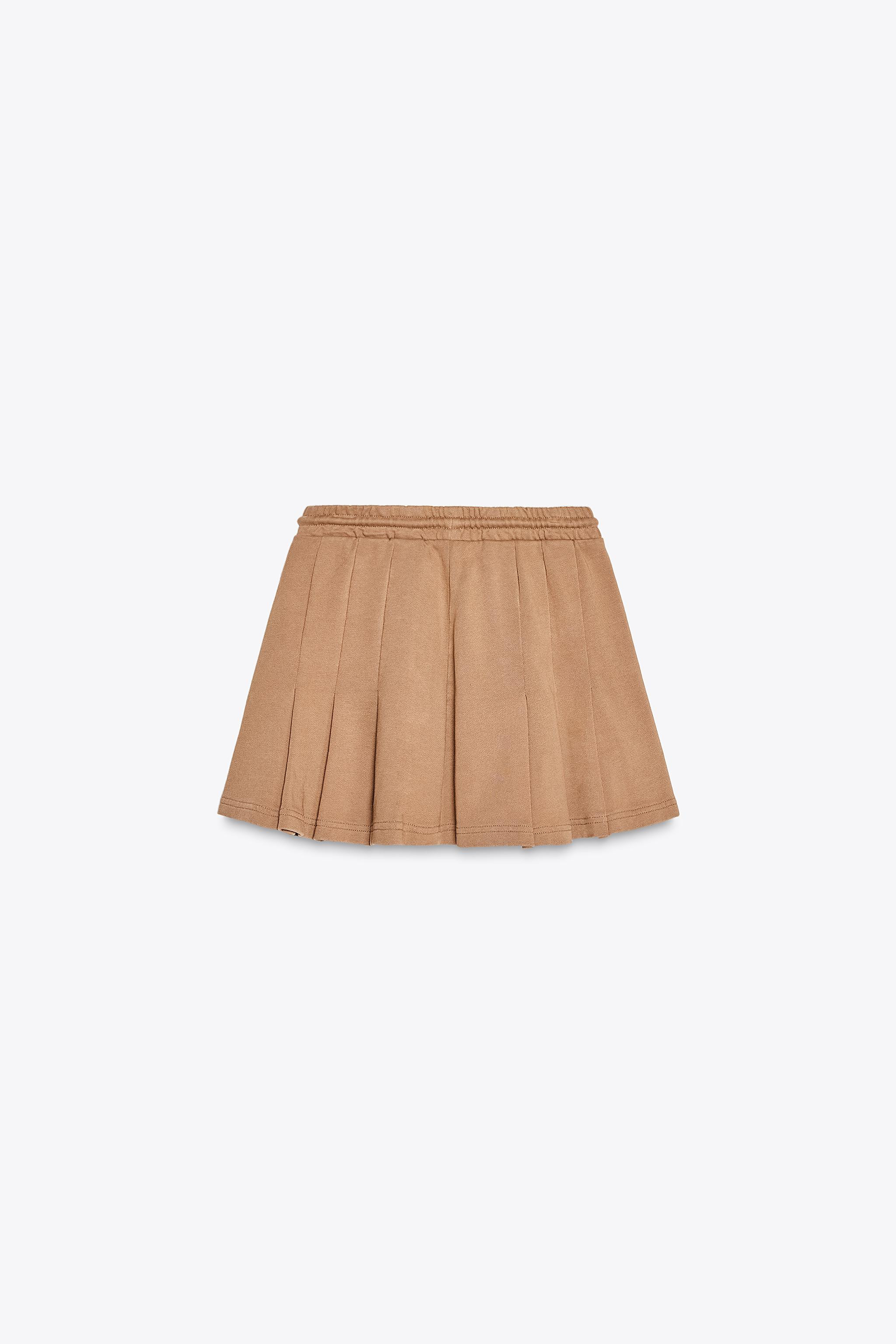 Mini skirt made of 100% compact cotton with a washed effect. Mid-rise with adjustable drawstring ... | Zara US