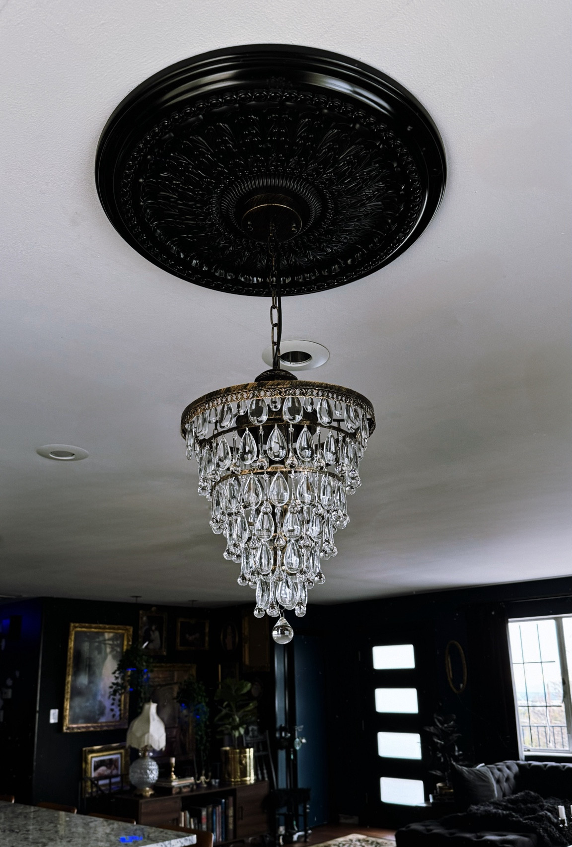 Dining room chandelier of my dreams😍 the ceiling medallion was white and I painted it black with a high gloss paint🖤

#LTKHome #LTKFamily