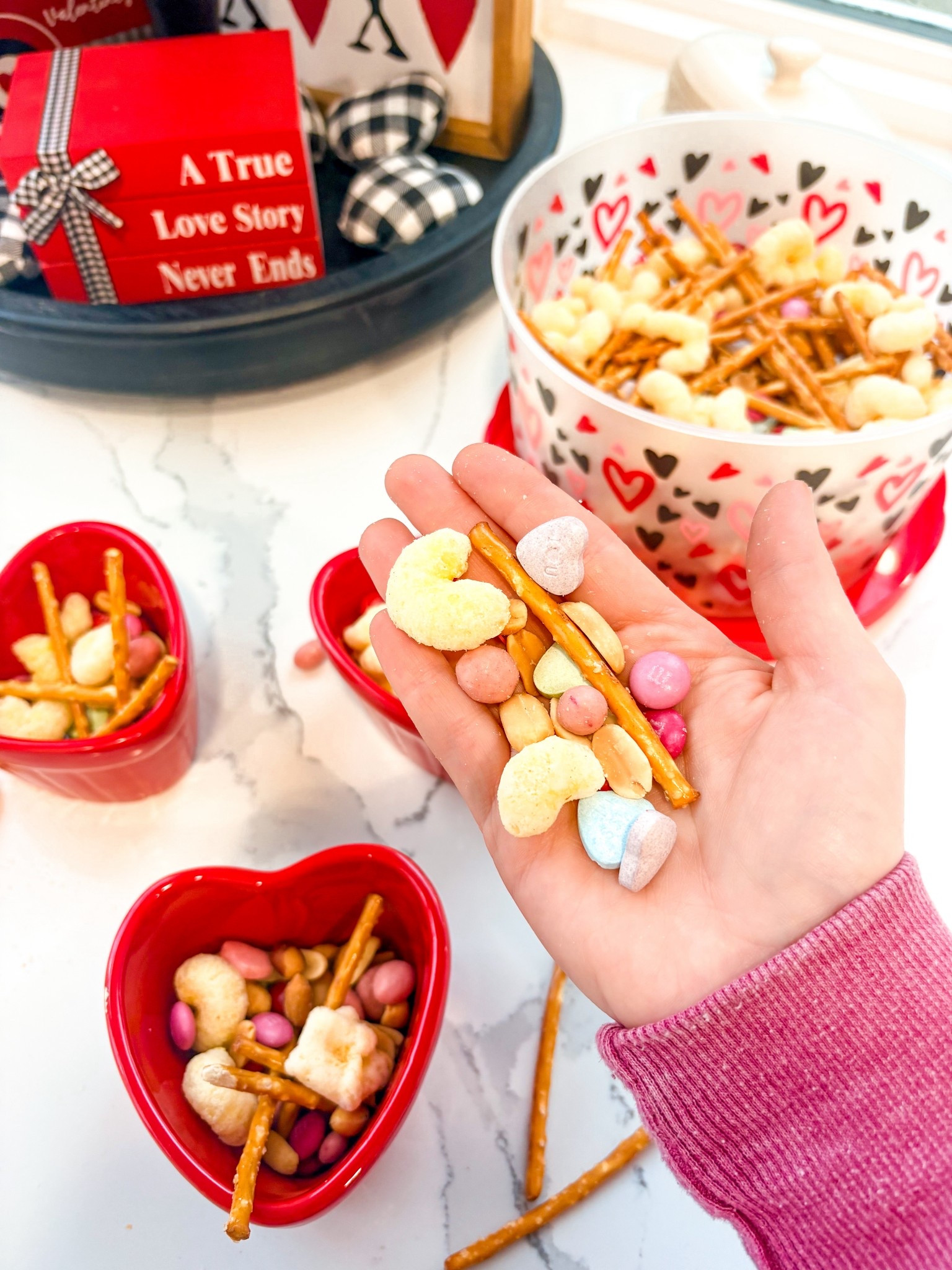 Valentine’s Day snack mix 💕 We got tougher covered strawberries from Trader Joe’s, but I bet the tru fru would be just as good!

#LTKfoodie #LTKKids #LTKValentine