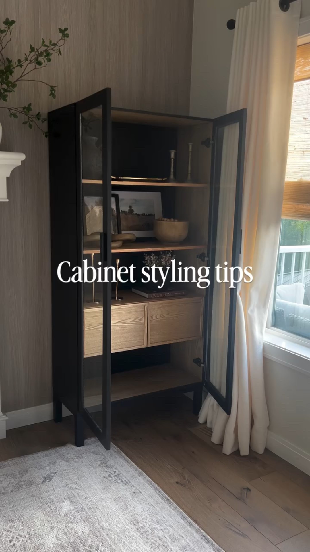 Comment Shop for decor links 🔗 

Cabinet shelf styling tips (for the changing seasons) TIPS below:

1. Always use varying heights, mix tall and low on each shelf always!
2. Find an inspo photo or two (you can find these on Pinterest or Instagram)
3. Use books and artwork to help with height and interest 
4. When the seasons are starting to change use subtle decor changes like art work / prints / stems / florals etc. 

SAVE for styling inspo and follow for more home content 🤎🤎🤎
.
.
.
.
#shelfstyling #cabinetstyling #shelfstyle #falldecoratingideas #neutralhomedecor #modernorganic #cozyhomes #fallstyling #falldecorinspo