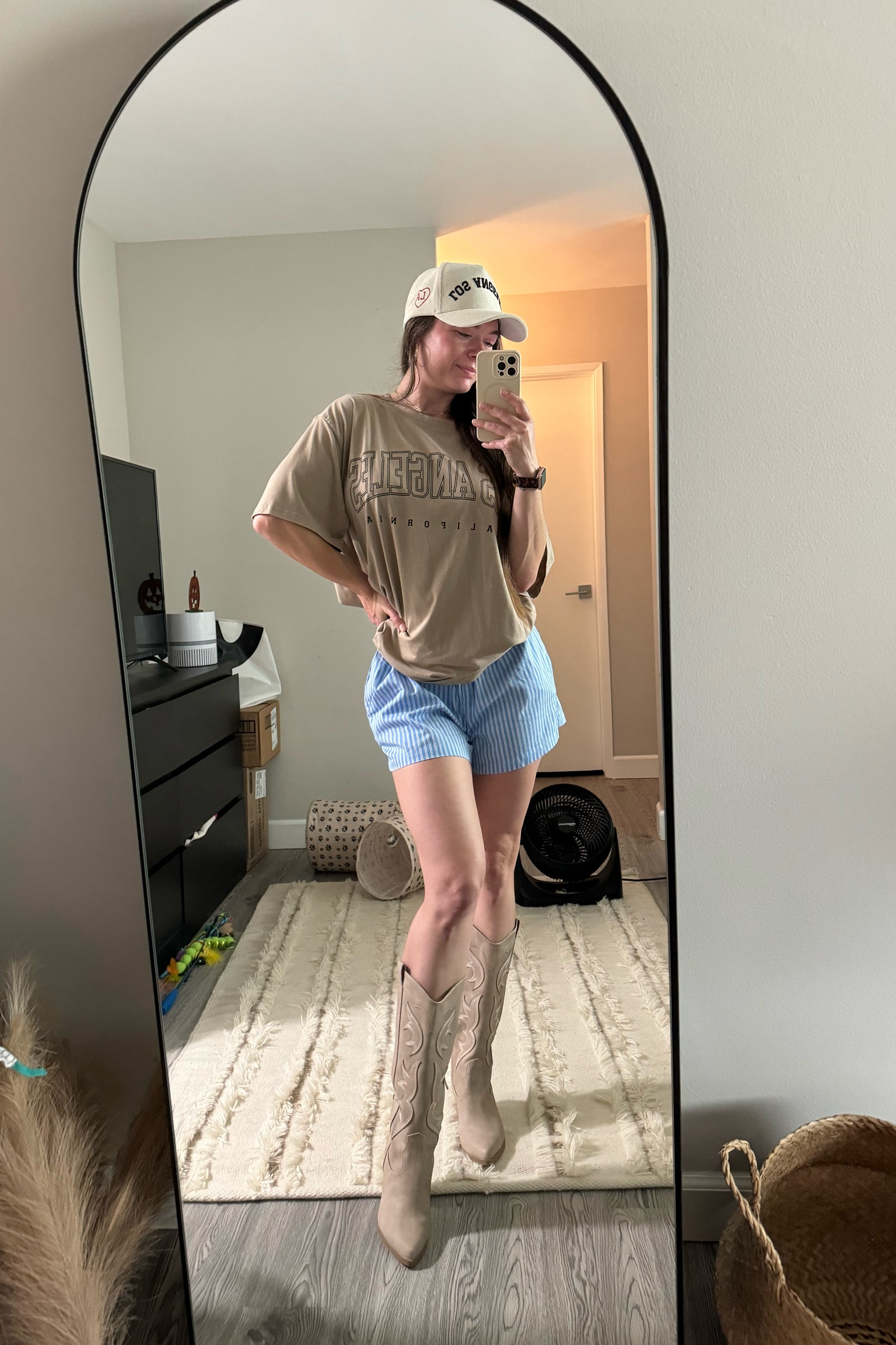 Urban cowgirl vibes 🤠 

Size large in the tee to have an oversized, fit, size medium in the shorts and 7.5 in the Dolce Vita cowboy boots (I went up 1/2 a size to wear insoles). 

#LTKxPrimeDay #LTKShoeCrush #LTKFindsUnder50