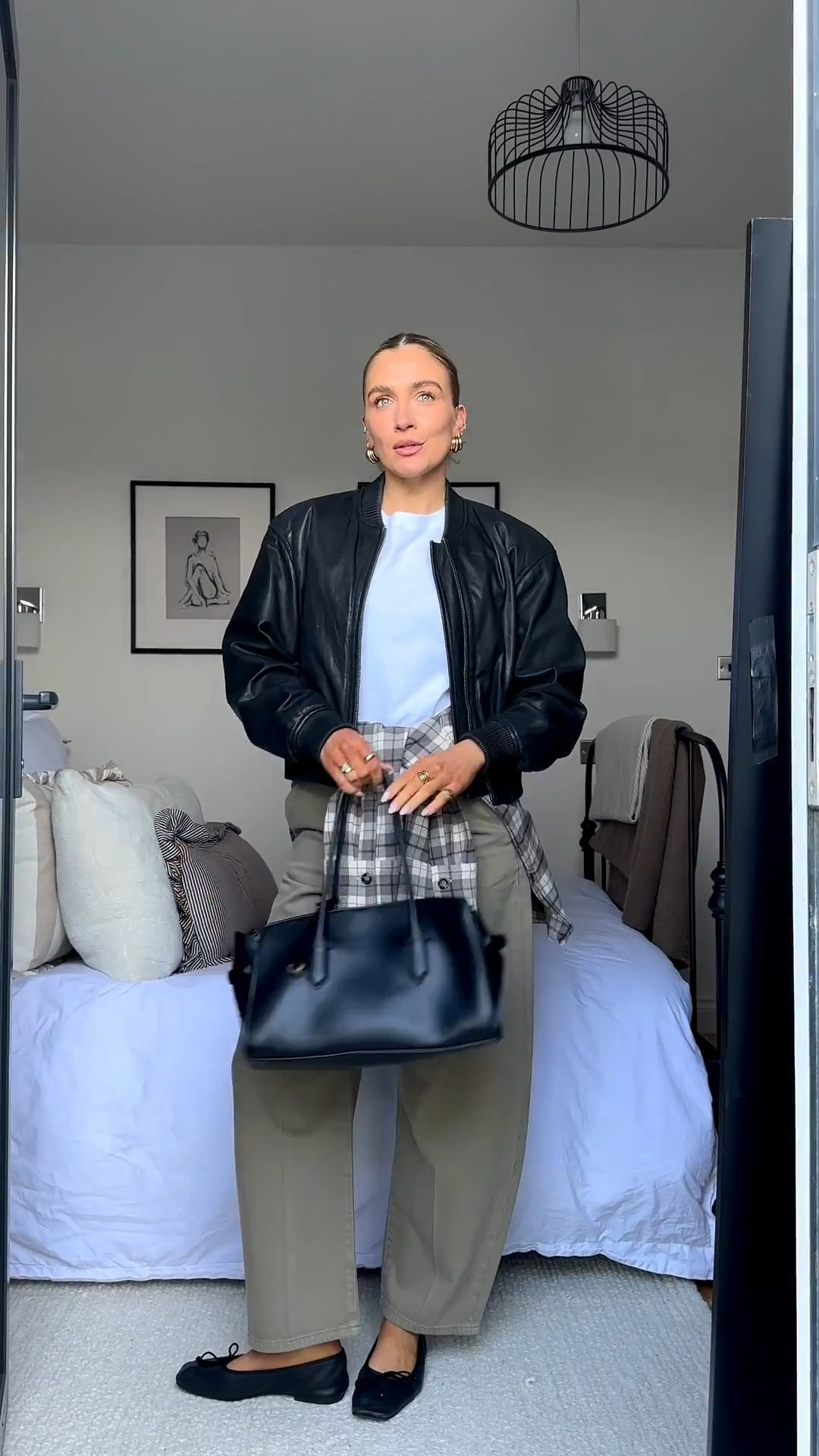 khaki wide leg trousers outfit, neutral spring outfit women, elevated casual outfit, minimal chic outfit, everyday capsule wardrobe outfit, khaki wide leg trousers high waisted, black leather bomber jacket women, white fitted t shirt outfit, plaid shirt tied around waist outfit, black shoulder bag minimal, black ballet flats outfit, effortless chic style, quiet luxury outfit, neutral layering outfit, parisian inspired outfit, off duty model look, how to style wide leg trousers, casual smart outfit women, spring transitional outfit, layering outfit idea women, polished everyday outfit, black lace bra  🤍

#LTKstyletip #LTKspring #LTKuk