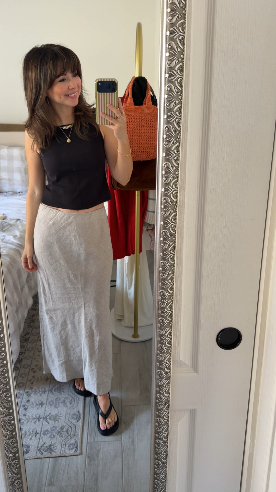5’2 petite linen skirt outfit. I love this midi length because it doesn’t overwhelm a shorter frame and the linen fabric keeps it lightweight for spring and summer. Styled with a simple black tank and platform sandals for an easy everyday mom outfit

Top small
Skirt XS 
Sandals 5 

#LTKPetite #LTKgrwm