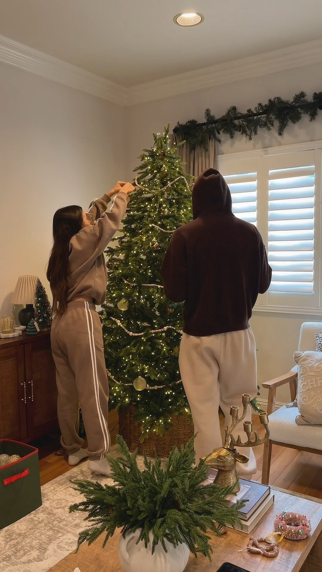 decorating the christmas tree 🤍 linking the 7.5’ christmas tree we have as well as three ornaments that are still in stock! and we used two of the World Market wooden bead garlands and one of the Amazon ones.

#LTKSeasonal #LTKHoliday #LTKHome
