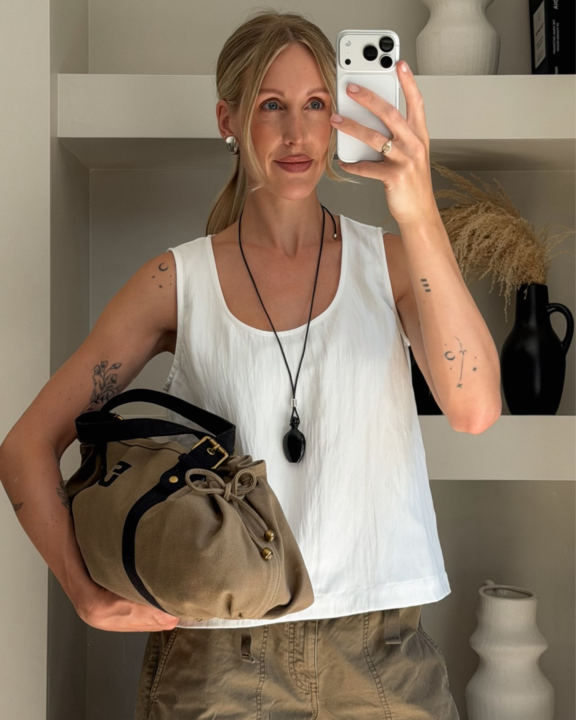 Summer outfit idea 

Albaray loose vest size 10
Gerard Darel khaki 24 hour canvas bag
Green cargos 
Mesh ballet flats 
Black pendant necklace

#LTKuk #LTKsummer #LTKeurope