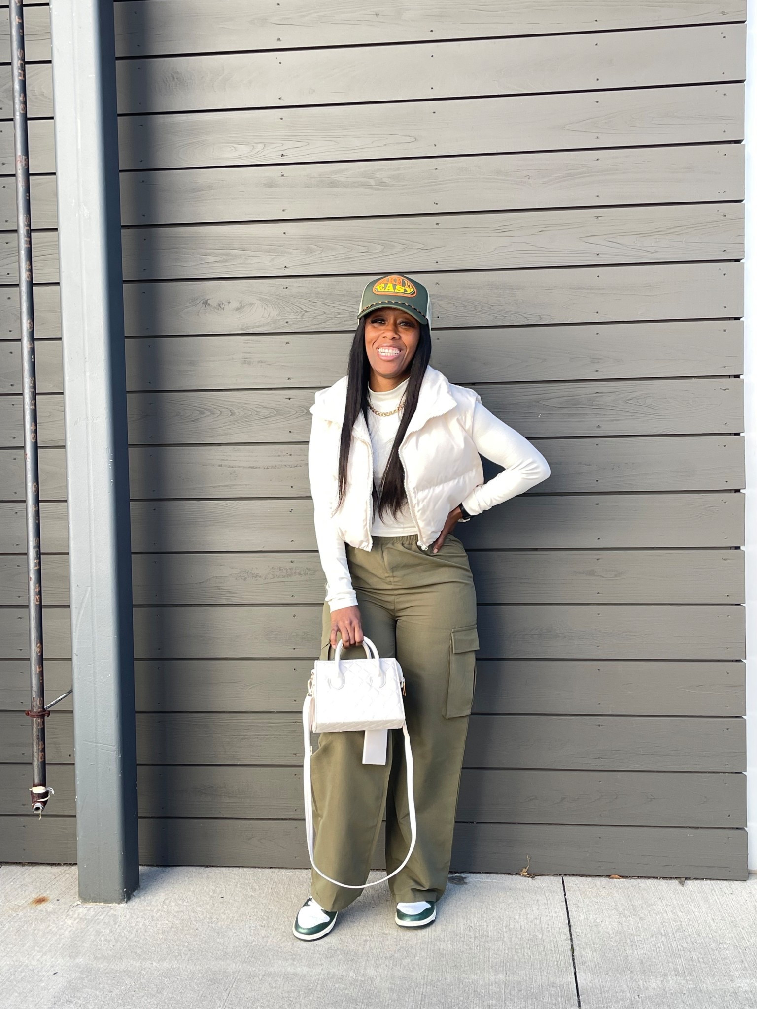 Wide leg cargo pants with puffer vest and long sleeve shirt. I styled this fall outfit with a trucker hat, cream purse, and Nike dunk low vintage green sneakers 

#LTKOver40 #LTKPetite #LTKStyleTip