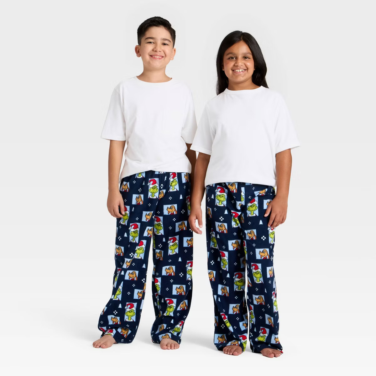 Kids' The Grinch Microfleece Holiday Matching Family Pajama Pants - Navy Blue | Target
