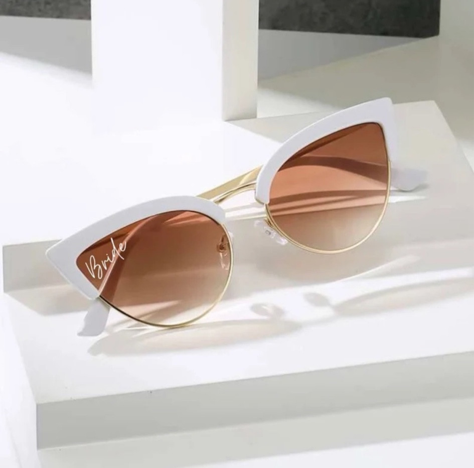 Bride sunnies for your bachelorette or honeymoon! ☀️

Sunglasses | white sunglasses | sunglasses for brides | bachelorette | honeymoon | wife | engaged | bride to be | wedding events | wedding style 

#LTKswim #LTKwedding #LTKstyletip