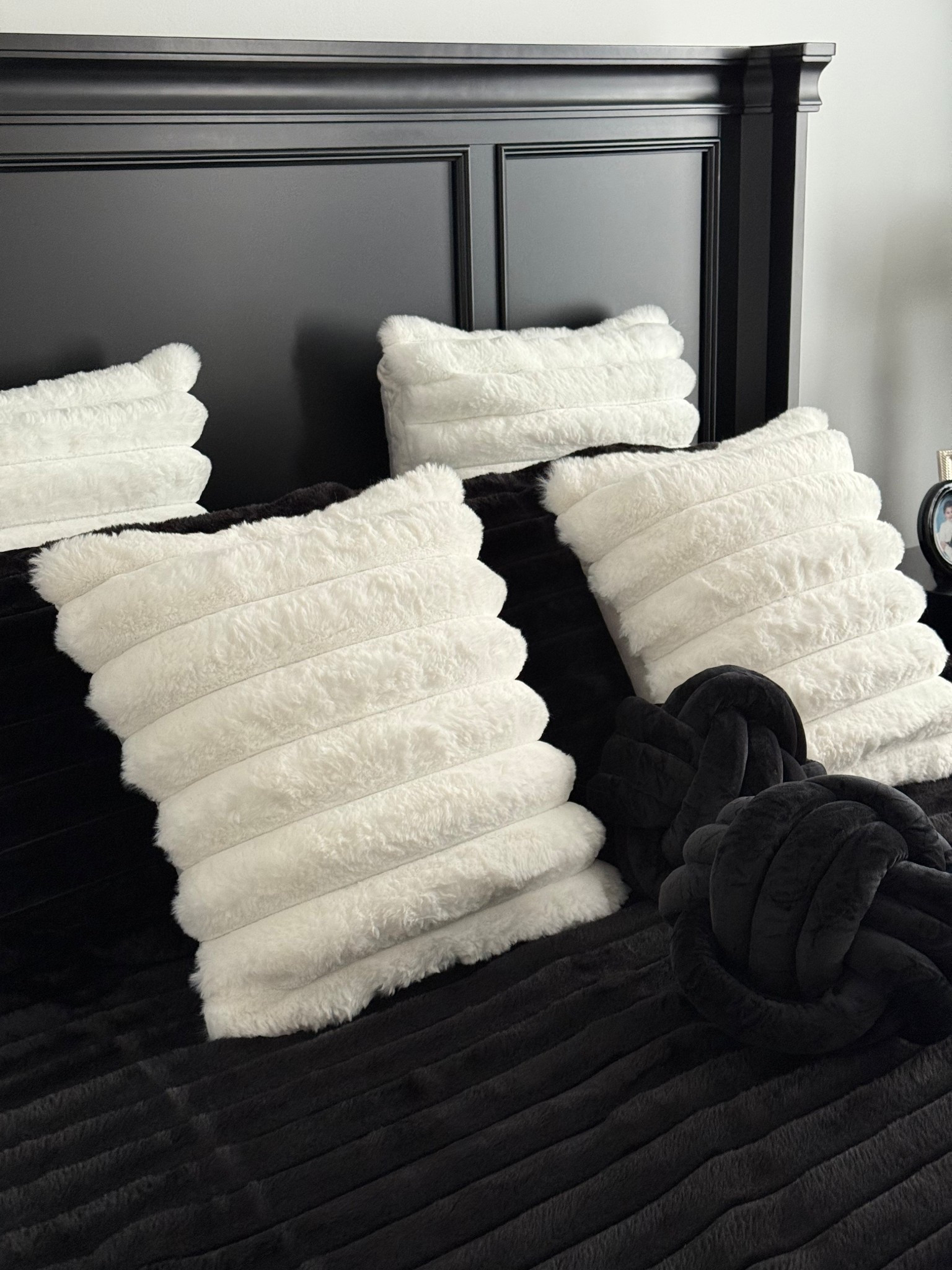 I love this cozy winter bed set! The white throw pillows in the two different sizes along with the black knot pillows, make this monochromatic set up a must have! 

#LTKFindsUnder100 #LTKHome #LTKSeasonal