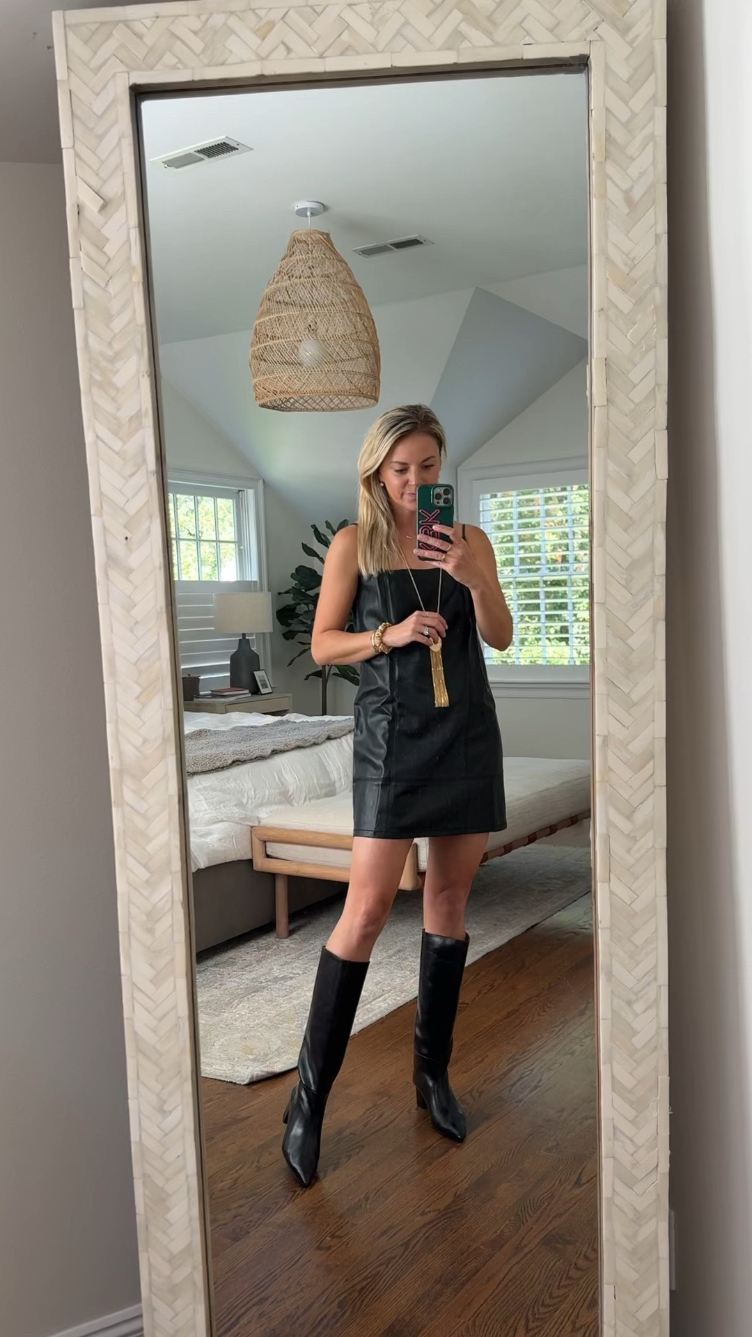 Fun faux black mini dress for fall 🖤 very comfortable and has adjustable straps 
•small dress, tts, I’m 5’5 
•boots tts