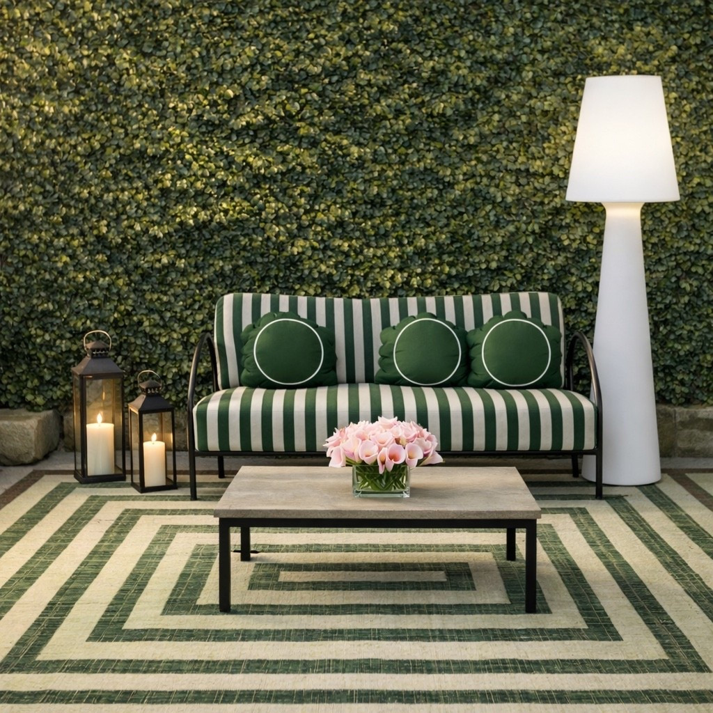 Early evening on the patio — that quiet moment between day and night when the light softens and the lanterns begin to glow.

I love this green stripe outdoor sofa because it feels both modern and timeless. The crisp stripe pattern gives it a contemporary energy, while the silhouette still carries a subtle classic charm.

Since the stripes already create strong visual rhythm, I balanced the space with a clean-line white floor lamp. The all-white sculptural form keeps the palette calm and prevents the space from feeling too busy.

A small arrangement of soft pink calla lilies adds a gentle touch of color — just enough to bring warmth without overpowering the green palette.

As the lanterns start to glow, the whole patio becomes incredibly relaxing — the perfect early-evening spot to unwind outdoors.

#outdoorliving #patioinspiration #stripedsofa #coastalliving #gardenpatio #callalily #outdoorlanterns #designinspiration #outdoorstyle #patiodesign

#LTKHome #LTKdayinmylife
