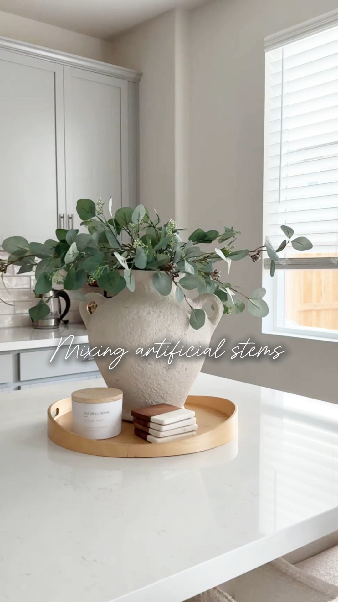 Mixing fresh stems to artificial floral arrangements is an easy way to update your look with more color or layers ✨

#LTKHome #LTKStyleTip