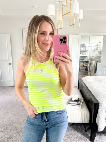 Bright striped tank top. Wearing small 
