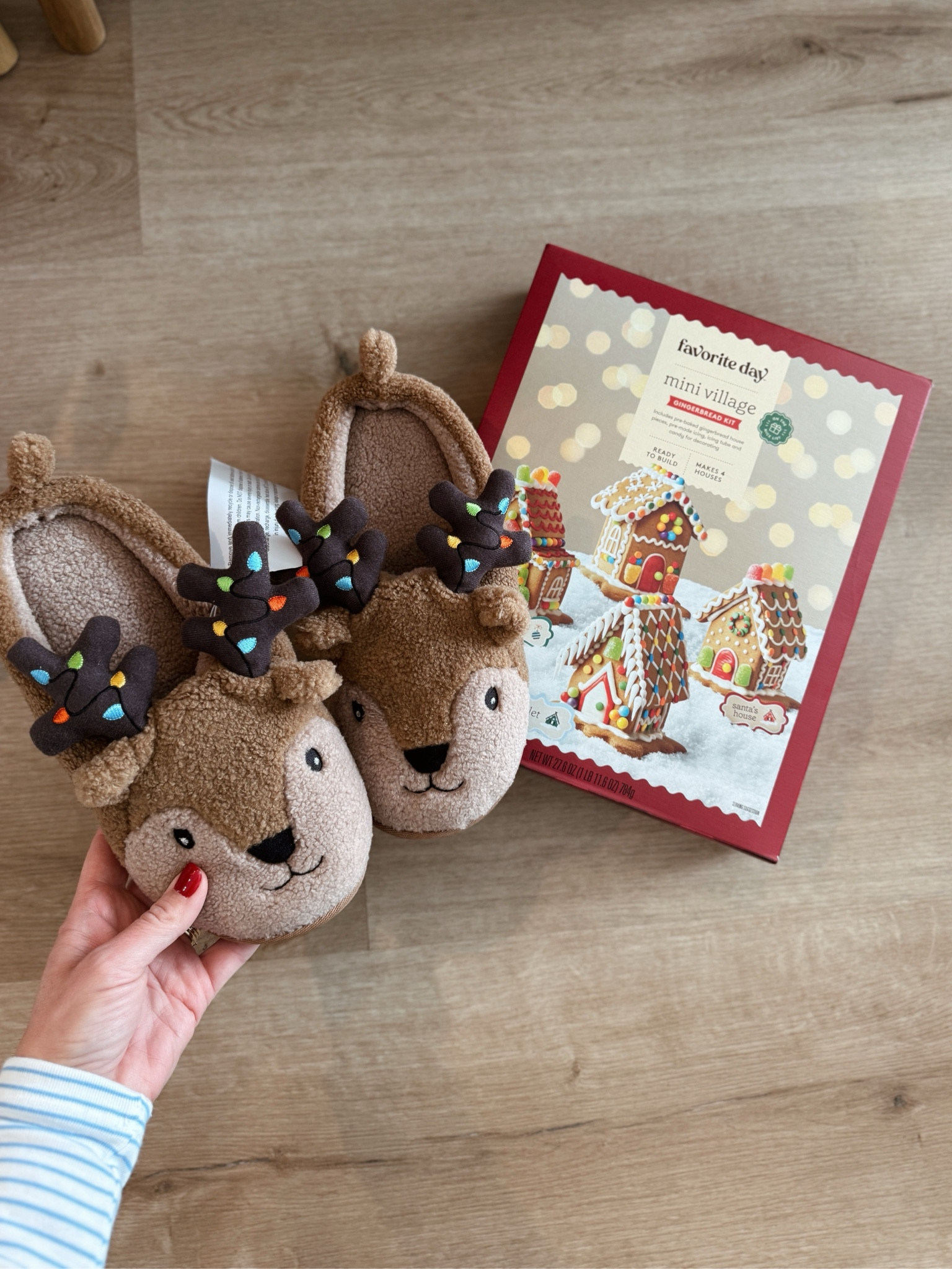 We love these gingerbread houses and they are currently on sale! I love the four mini piece because I have four kids and they can all decorate their own individual house. I also found the cutest kid reindeer slippers. The antlers light up when you walk and they are so fun!!

#LTKHoliday #LTKSaleAlert #LTKHome