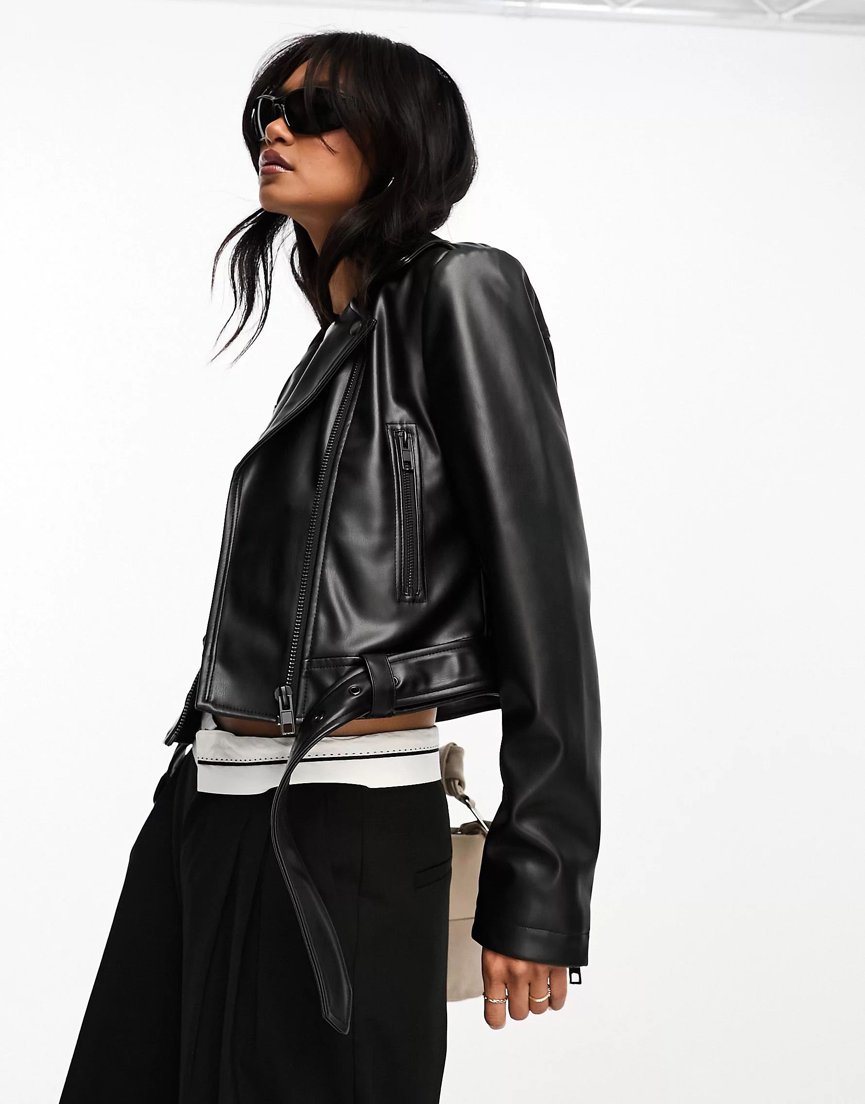 ASOS DESIGN faux leather shrunken moto jacket with belt in black | ASOS (Global)