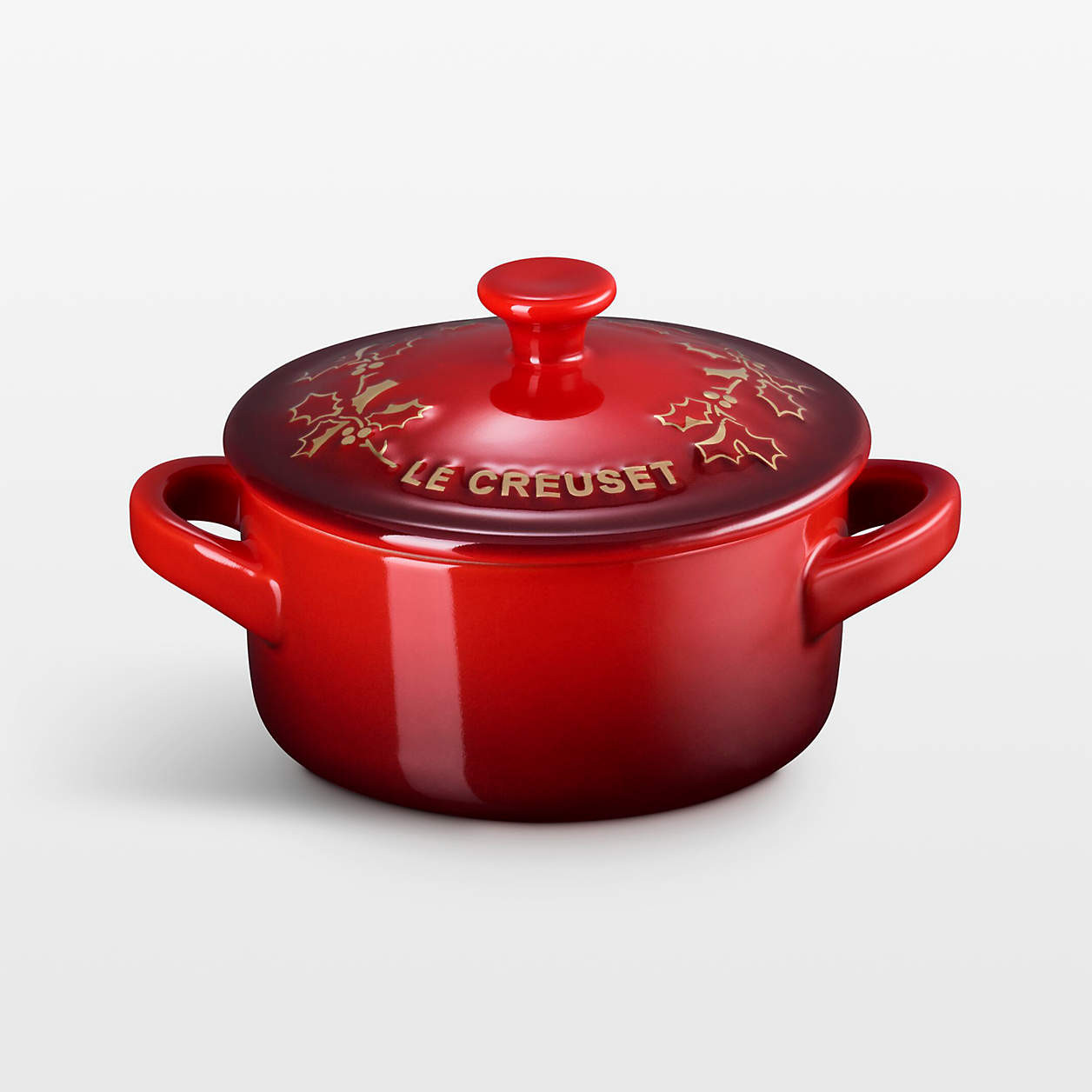Le Creuset 8-oz. Cerise Holly Stoneware Mini Round Cocotte with Gold Knob | Crate & Barrel | Crate & Barrel