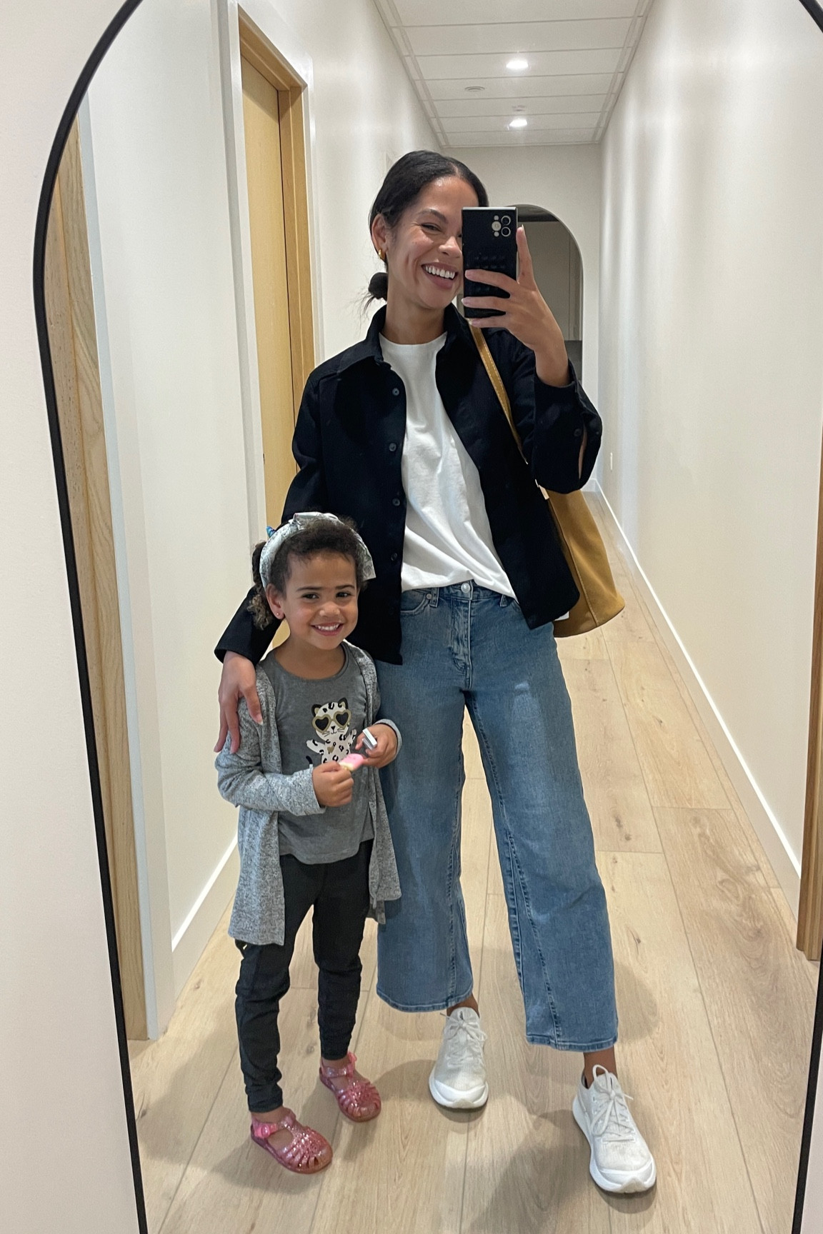 Black denim shirt jackets jacket classic white tee relaxed jeans white sneakers suede bucket bag fall outfit  