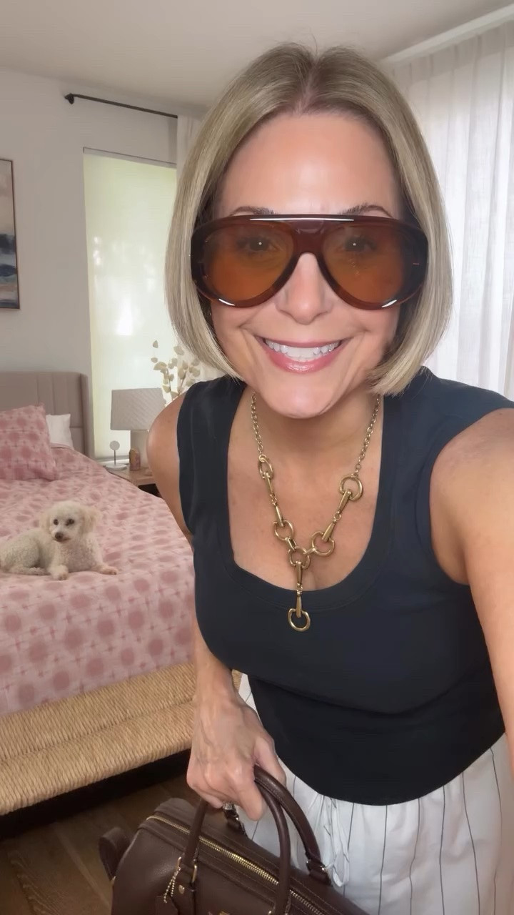 OOTD with my baby Ruby 🐶❤️ Linked in my stories and LTK shop (link in bio) where I earn a small commission when you use my links 🔗 #casualworkfit #coachbags #bubbleskirt #budhagirl