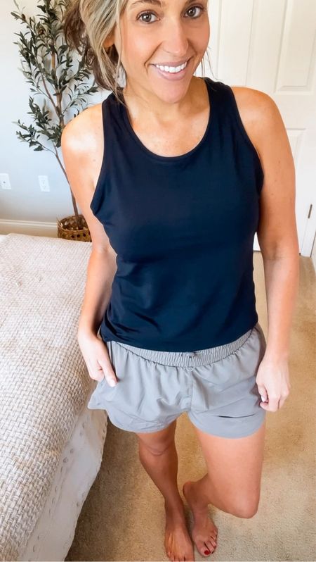 Today Walk outfit of the day! Perfect athleisure outfit, walking outfit or just an every day comfy look. Love the pockets on the shorts, one side has zipper pocket. Love the comfy loose fit of the racer back tank 

#LTKStyleTip #LTKFindsUnder50 #LTKFitness