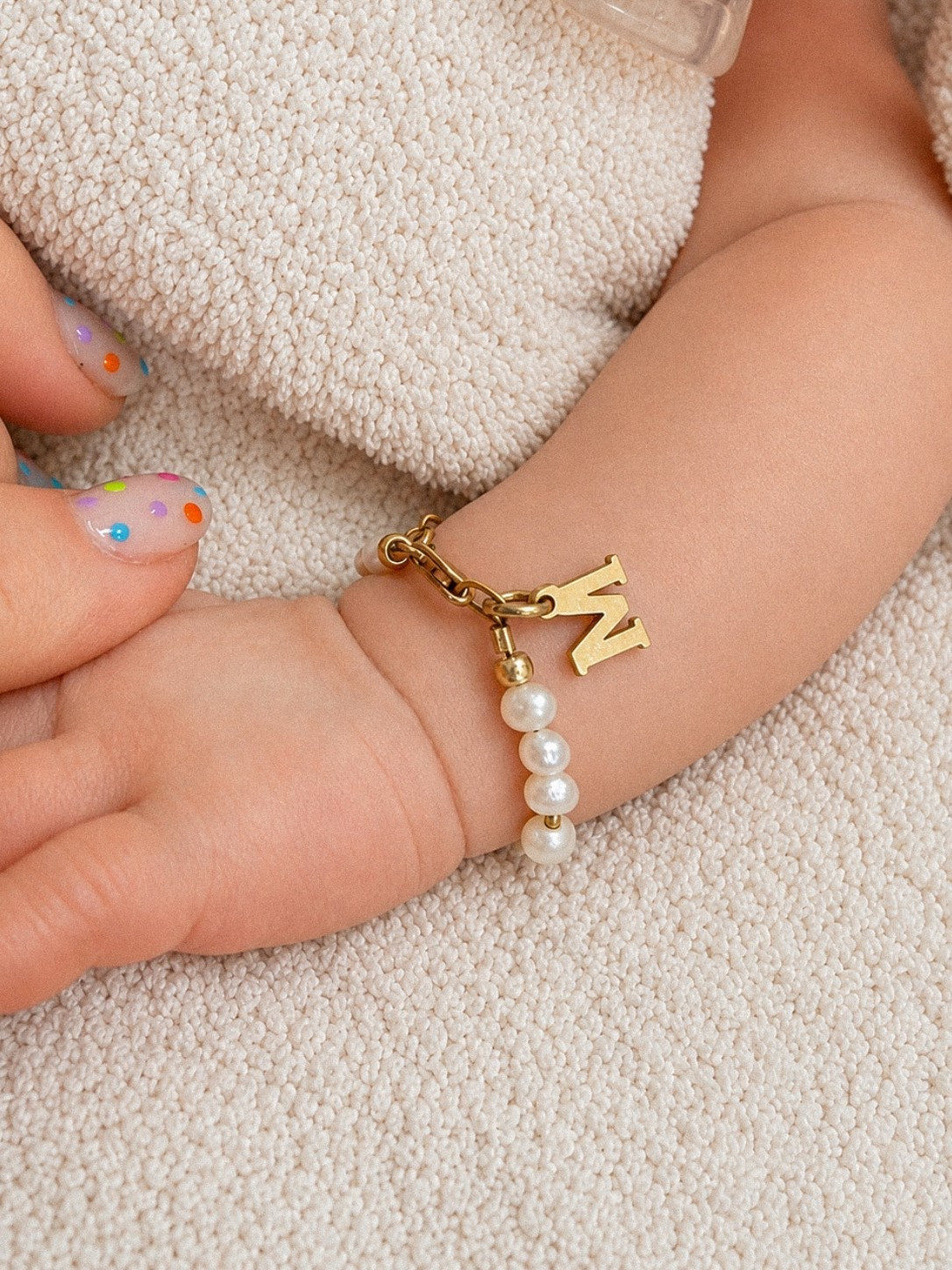 Preemie / newborn pearl bracelet with initial charm.

#LTKBaby #LTKKids #LTKBump