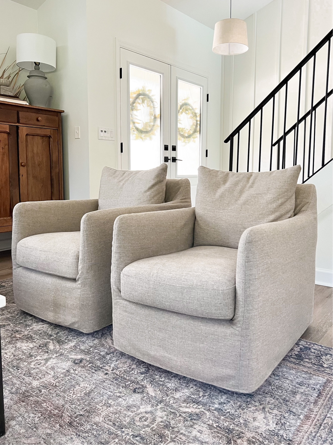 Upholstered slip-cover swivel chairs. Pictured color: Alcala Taupe

UPDATED 11/24. Sale sites are constantly changing. They sell out quickly once on sale. 

Width 27”, Height 32.75", Depth 35.5”#LTKSale

#LTKstyletip #LTKCyberWeek #LTKhome