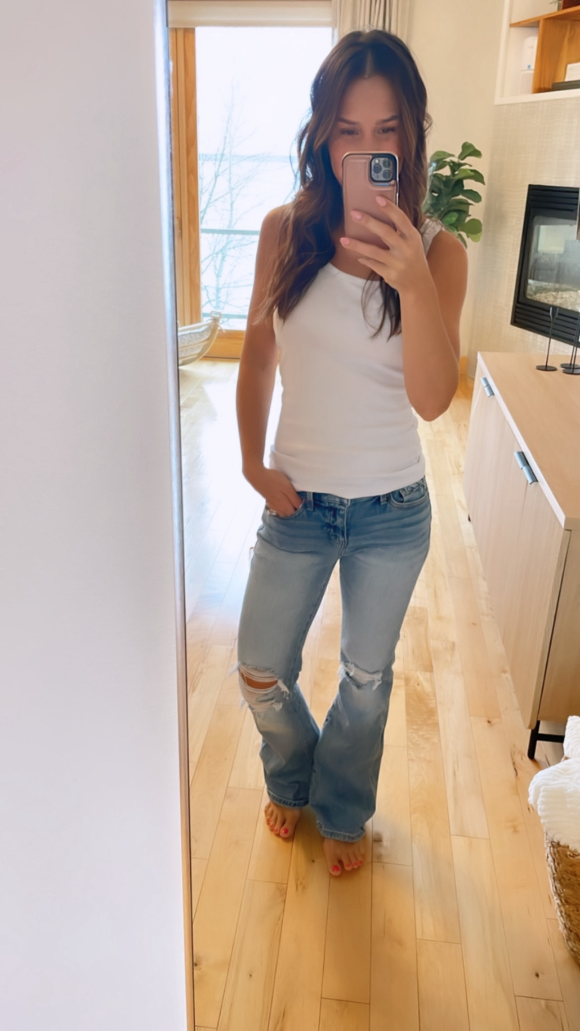 The classic basics

This tank comes in multiple colors and feels like butter. Perfect for layering or wearing alone.

These jeans have stretch BUT don’t stretch out throughout the day. They allow you to move and be active but not have diaper booty 😉

