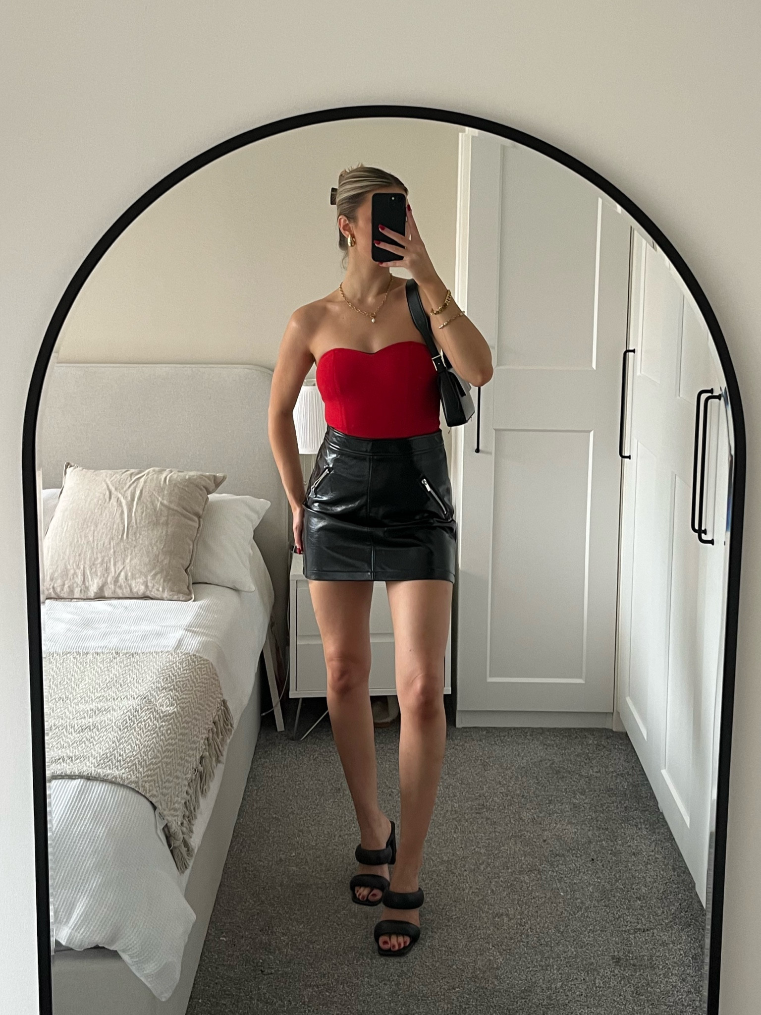 Christmas party outfit inspo! 
Leather skirt 
Red bodysuit 
Black heels 
Zara shoulder bag 

#LTKSeasonal #LTKHoliday #LTKCyberWeek