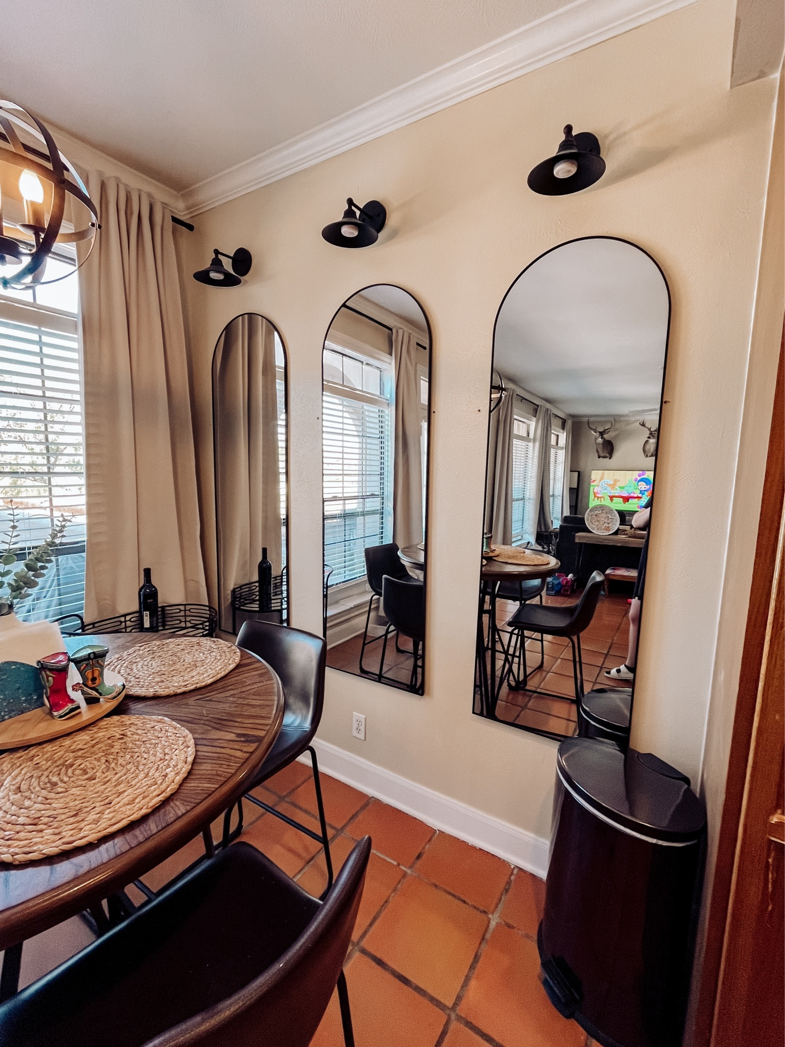 Kitchen mirrors are highly underrated! Love how this small space feels bigger and more homey at the same time. 

Side note: the sconces are not hardwired. I attached battery powered lights instead! 

#LTKGiftGuide #LTKfamily #LTKhome