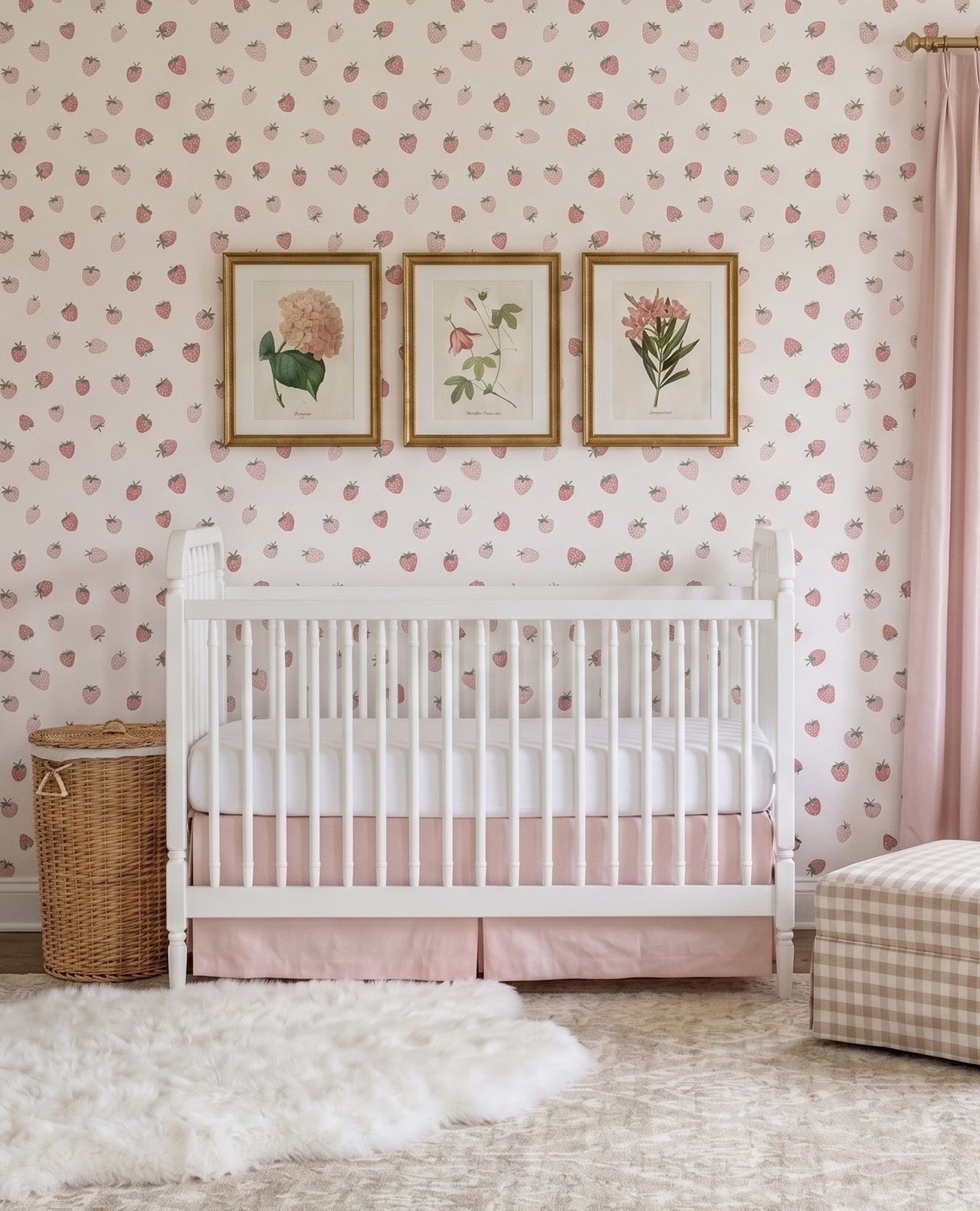 It's funny which nursery designs seem to resonate. This nursery was for a virtual client almost 2 years ago, but the strawberry wallpaper has been spiking like crazy on Pinterest for the past few weeks!⁠ 
⁠
The best part of this particular wallpaper is that the colors are fully customizable. For this client, we lightened up the background and changed the strawberries to a slightly more pink color. You can play with the colors in real-time on the site!⁠
⁠
Design by Little Crown Interiors