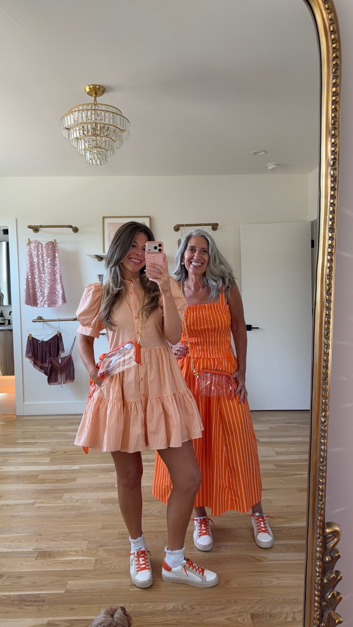 mom & me orange-and-white striped mini dress with puff sleeves, orange-and-white striped maxi dress with a smocked bodice game day looks for your next sporting event! 🏈 
avara code for 15% off: emerson 

i'm 5'4" and typically wear a small/2

mom is 5'4" and typically wears a medium/6

mom & me outfits, mom & me dresses, matching outfits, mother daughter outfits, family photo outfits, fall outfits, fall dresses, autumn outfits, midi dresses, fall dresses, casual outfits, thanksgiving outfits, family photo outfits, fall fashion, autumn fashion, cozy outfits, transitional outfits, neutral outfits, everyday outfits, weekend outfits, women’s fashion, sports, athletic, team colors, game day outfit, football outfit

#LTKgrwm #LTKSeasonal #LTKootd
