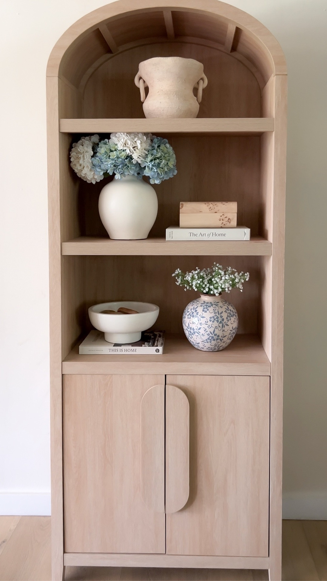 Decorating my arched cabinet for summertime

#LTKHome #LTKSeasonal #LTKSaleAlert