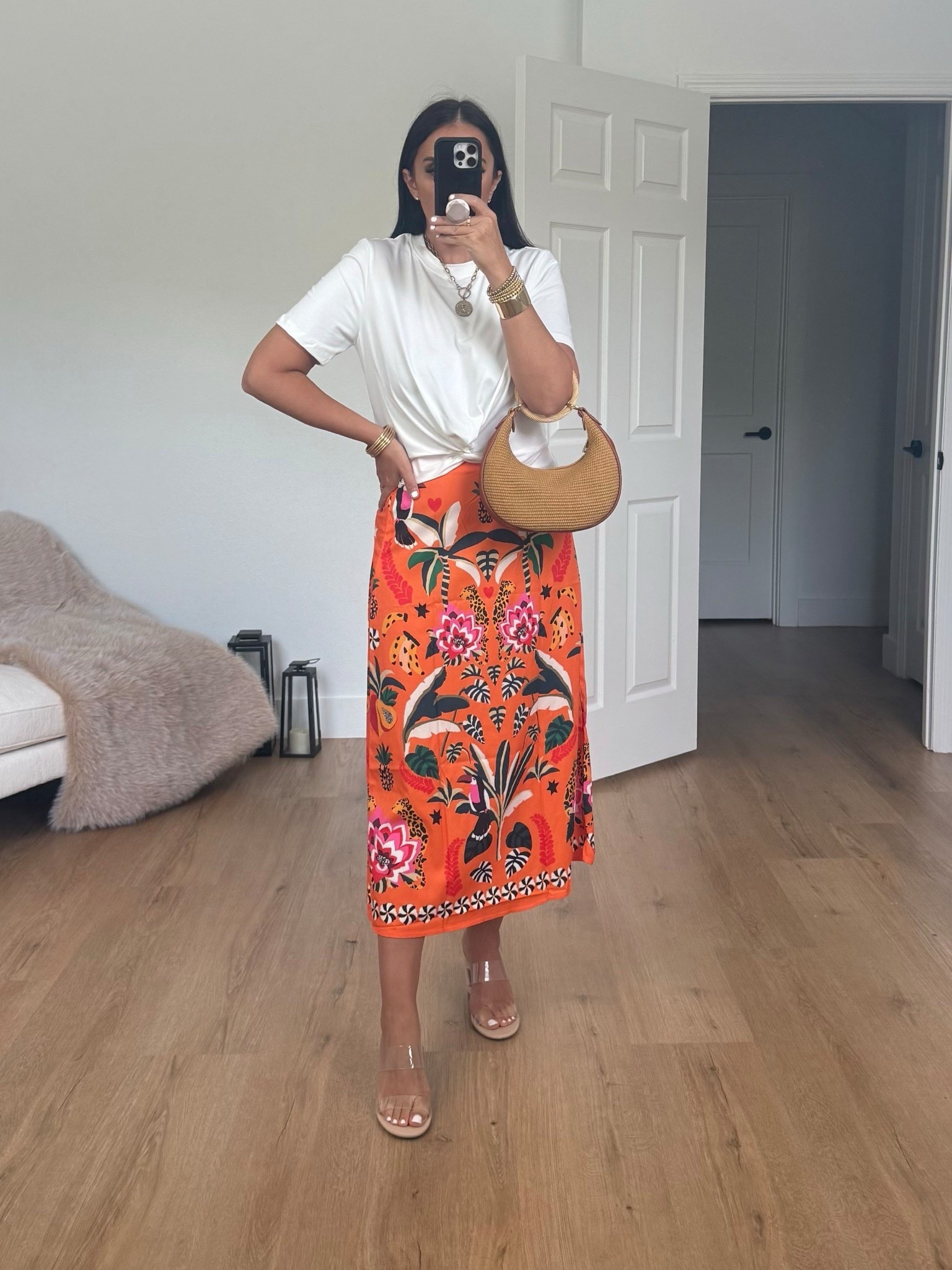 Orange tropical skirt from Amazon wearing size medium. Gives farm Rio vibes 