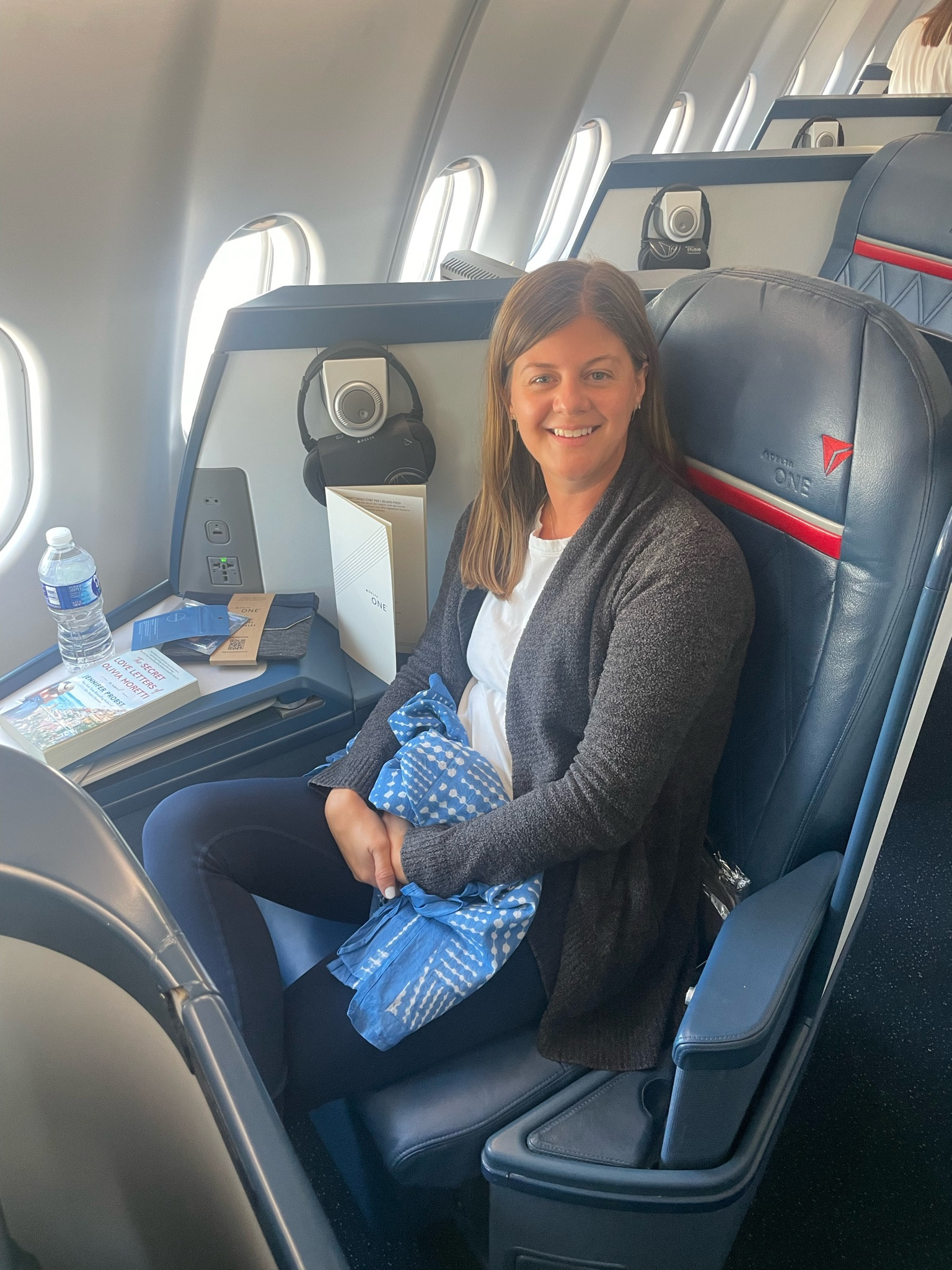 #travelootd - can’t travel without my #barefootdreams cardigan, white sneakers and a pareo!

#LTKstyletip #LTKunder100 #LTKtravel