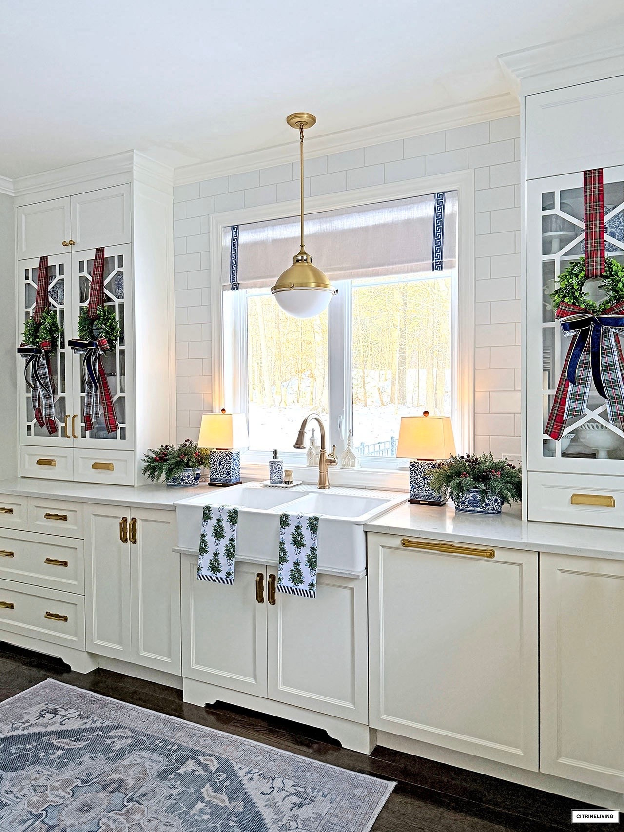 Classic and chic Christmas kitchen details! Layered wreaths, ribbon, greenery and the cutest tea towels!

#LTKHome #LTKstorytime #LTKHoliday
