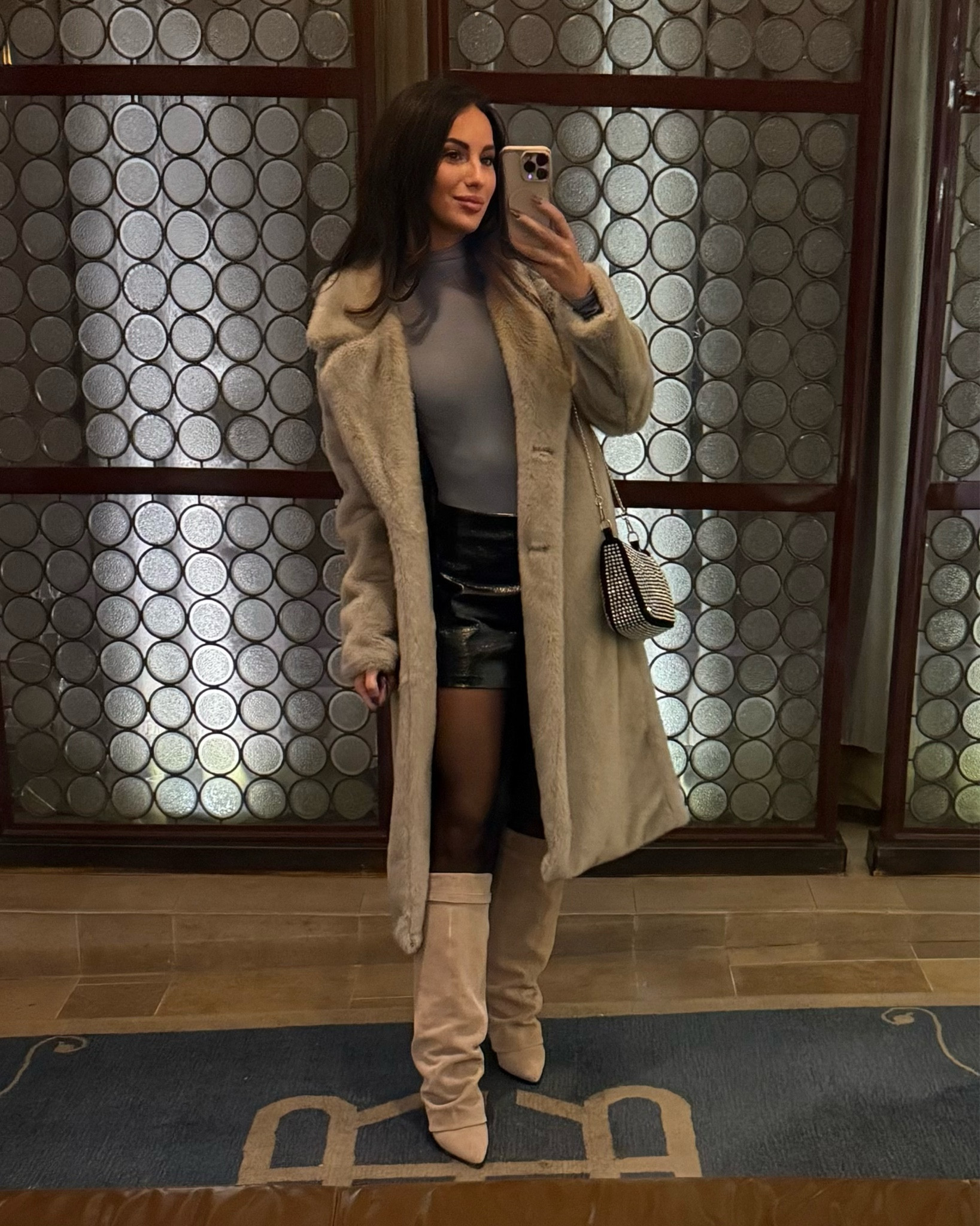 love this winter outfit ❄️🖤 the official winter boots of the season, & this leather skirt (leather-ish) goes with literally everything. obsessed. 

#LTKShoeCrush #LTKMostLoved #LTKSeasonal