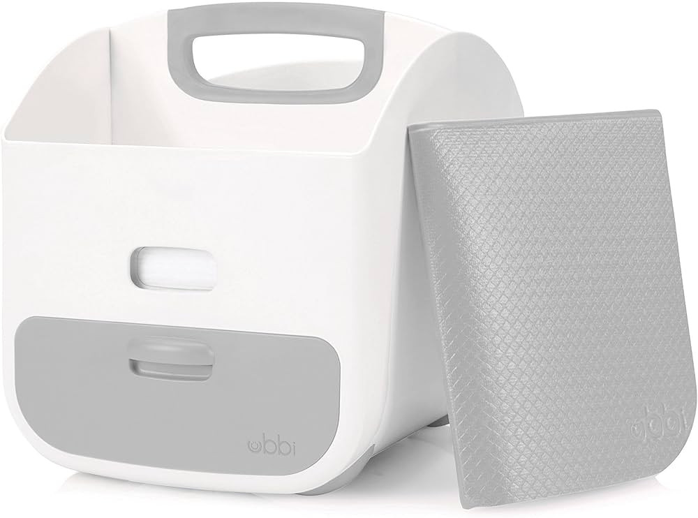 Ubbi Portable Diaper Changing Station Diaper Storage Caddy Organizer with Folding Changing Mat, S... | Amazon (US)