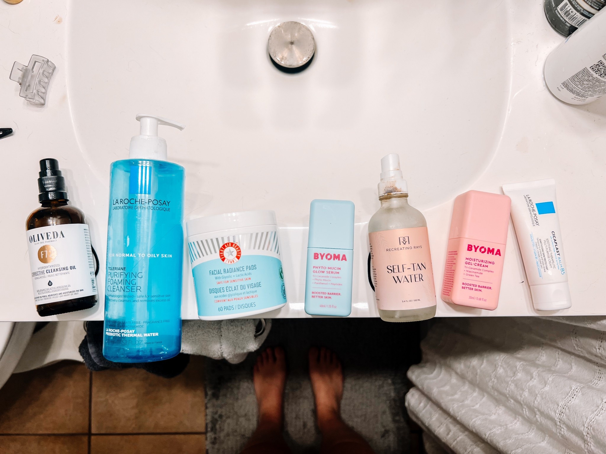 This is not medical advice. If you have legit skin concerns, go see a dermatologist. But this is my reminder to you that your skin care routine doesn’t have to match or be expensive.
This is a routine I’ve finally stuck with for more than 3 days and I think I love it!!
I’m not married to the toning pads but they’re good. I’ll probably try different ones when these run out, but I asked my esthetician what I can do to make my pores smaller and she asked if I had any acids. I literally found these in my junk closet but I do think they’re helping!! 
The cleanser and the cicaplast are both recommendations by my skin care queen, former dermatologist, now nurse injector, Hannah Muglach. La Roche Posay has never disappointed me.
The Byoma brand is new. Recommended by a good friend and I loveeee. It all had a super great rating on Yuka!
Anyway, everything is linked except the oil cleanser and the tanning water. Message me on insta for the links (@abbeygrone)

#LTKWatchNow #LTKBeauty #LTKFindsUnder50