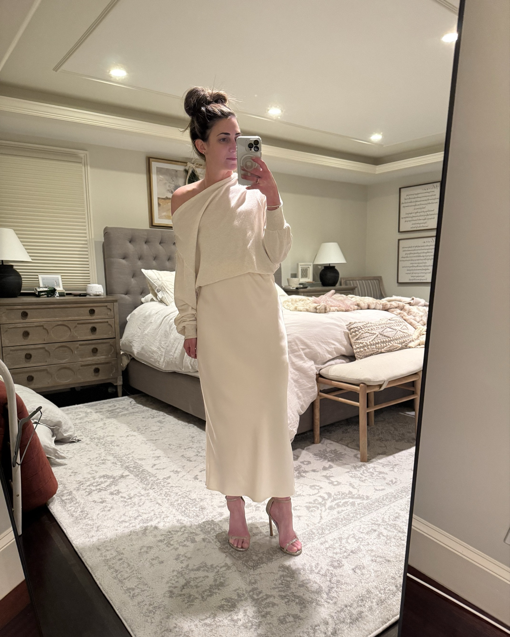 Holiday look winter white silk slip skirt embellished sweatshirt gold lame heels 

#LTKHoliday #LTKSeasonal #LTKParties