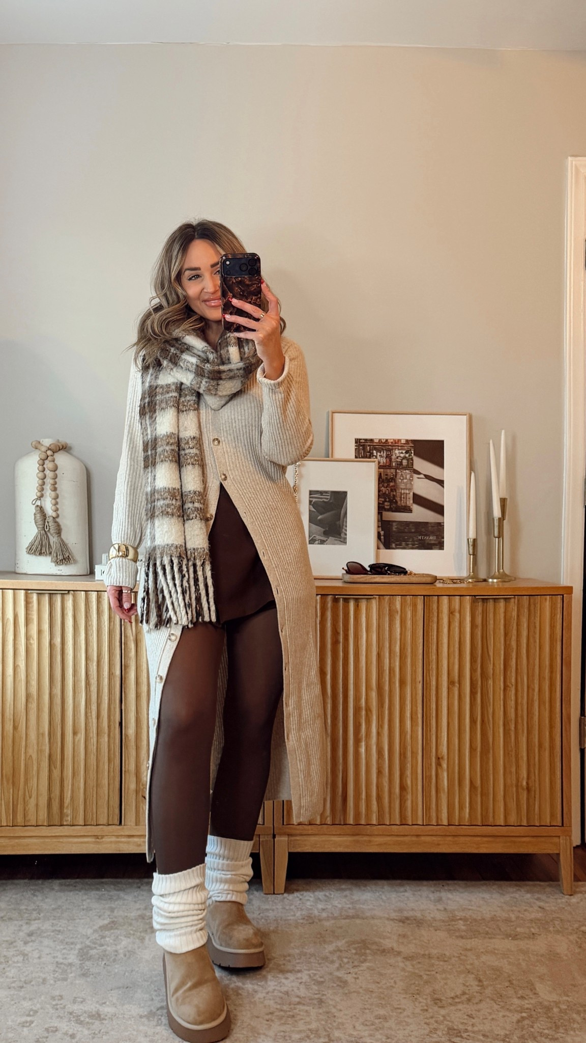cute winter outfit idea! layering a duster cardigan with a skirt! i’m in a size S cardigan, size M skort & tights. abercrombie, zara, amazon

#LTKFindsUnder100 #LTKootd #LTKHoliday