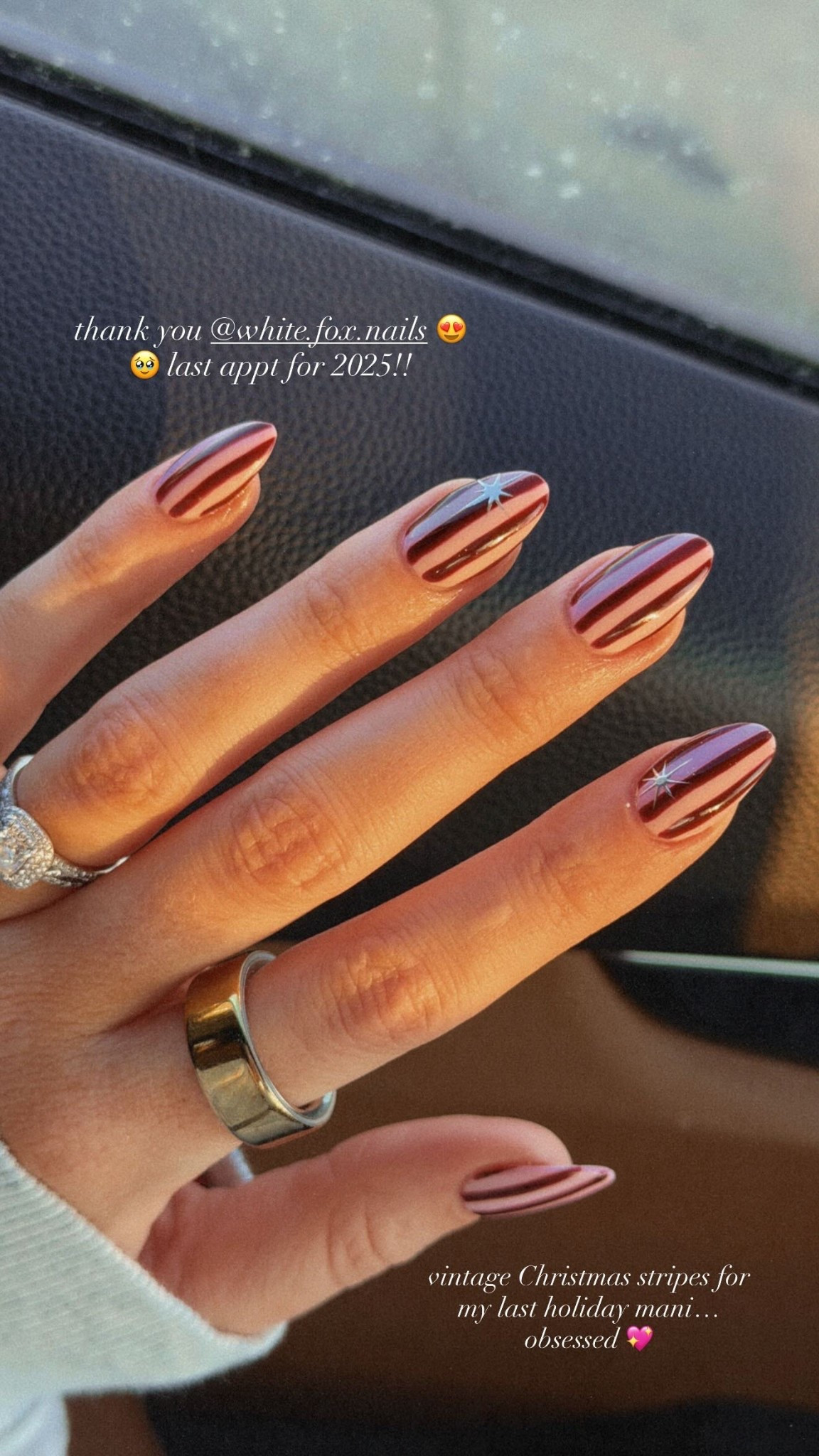 vintage Christmas stripes for my last holiday mani… obsessed 💖 thank you @white.fox.nails 😍🥹 last appt for 2025!!