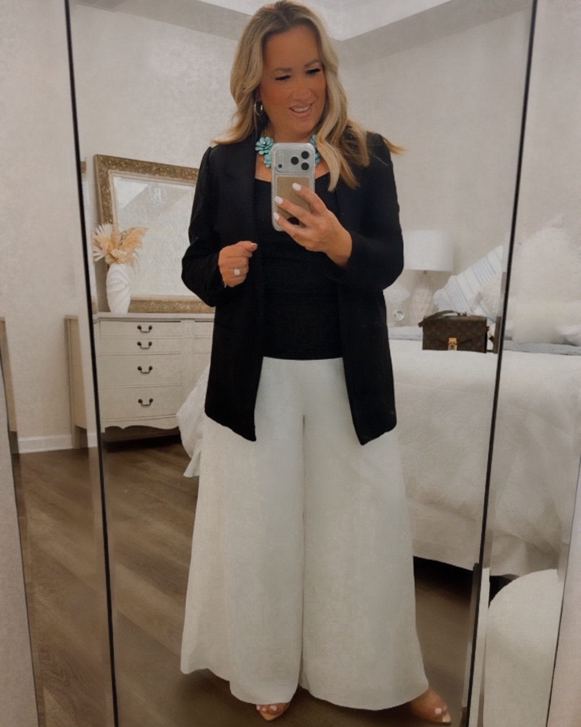 Timeless with a touch of statement.

A classic black blazer paired with flowy wide-leg pants is one of those outfits that always looks polished, sophisticated, and effortless. Added a pop of turquoise for a little personality and color.

Everything linked on my LTK @allaboutastyle 
Follow along for elevated style, timeless pieces, and designer-inspired finds for less.