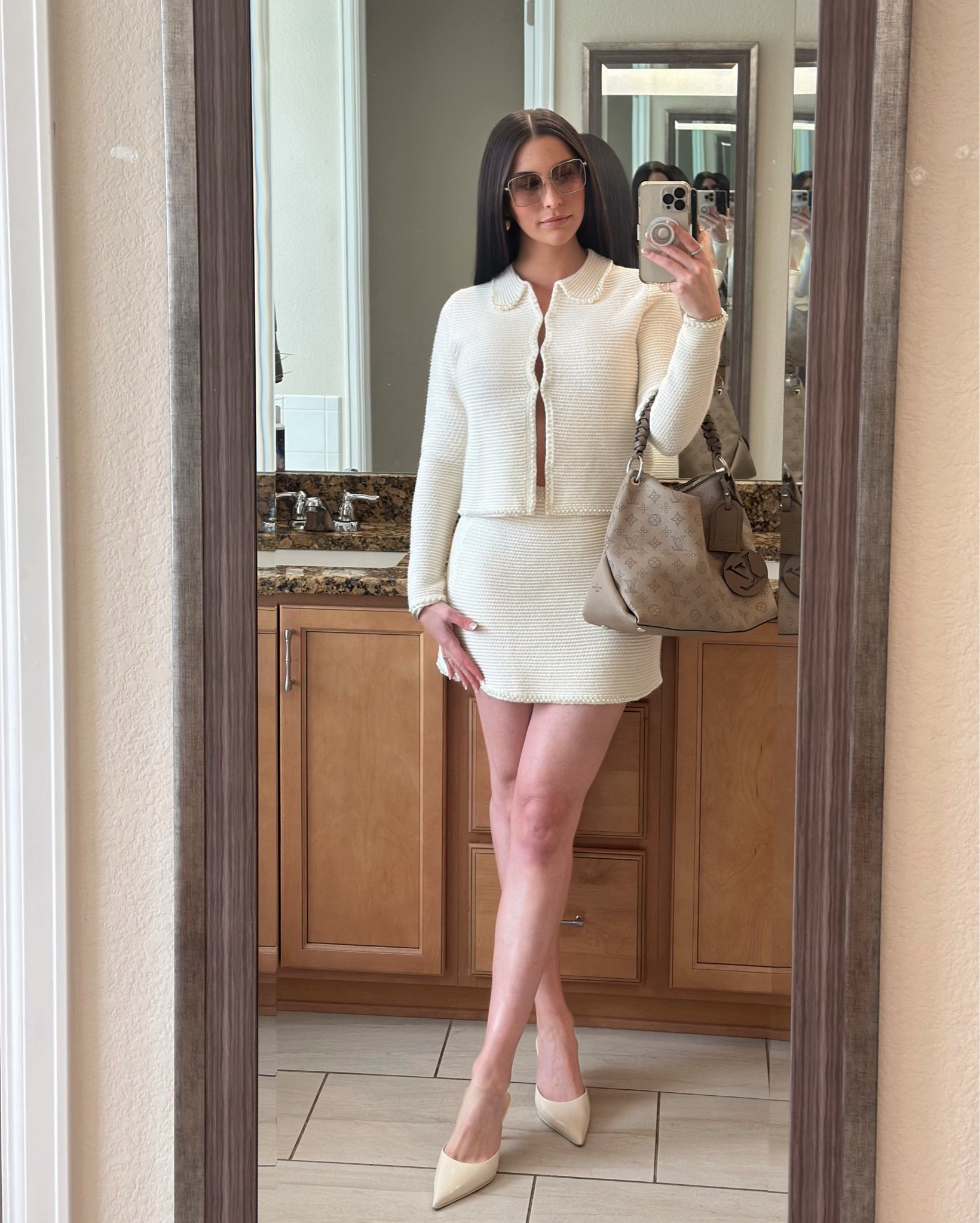 The perfect cream pearl knit set for spring. The skirt is a high waisted skirt with elastic waistband pearl embellishment & a-line silhouette. The pearl knit cardigan is a lapel collar jacket with long sleeves. The cardigan also has a pearl detailed finish and a concealed front snap closure. 

#LTKStyleTip #LTKFindsUnder50 #LTKFindsUnder100