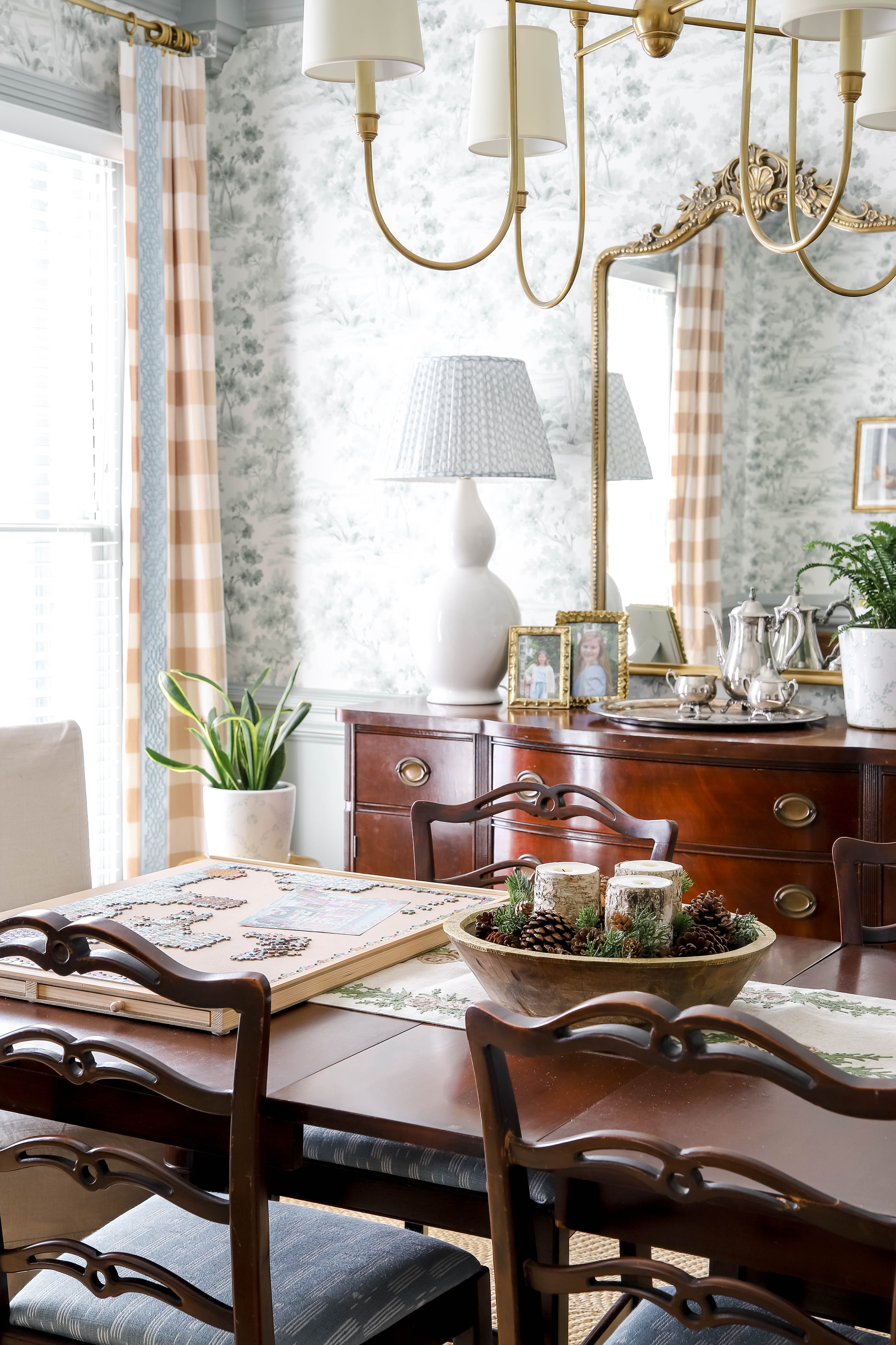 In my puzzle era! I love setting up my puzzle board at the end of my dining room in the winter months. It gives me a space to decompress away from screens and uses a room that oftentimes isn't used as much during these months. But when we do want to host or use the table, I just move my puzzle board and it's back to "normal." My happy place! 

 #LTKselfcare #LTKHome