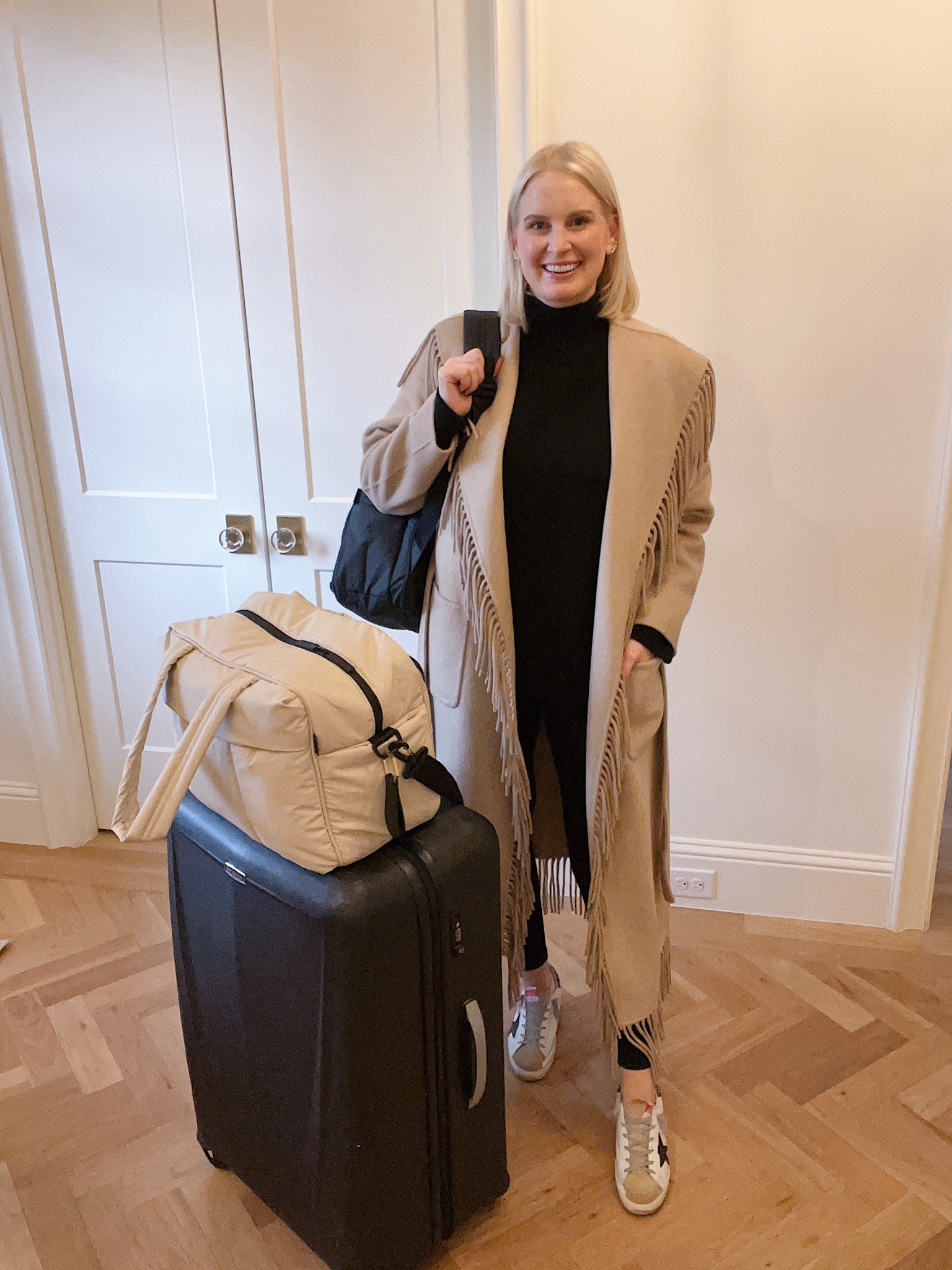 Today’s travel outfit! ✈️ Wearing a medium in the coat, sweater and leggings 🖤 

#LTKitbag #LTKtravel #LTKstyletip