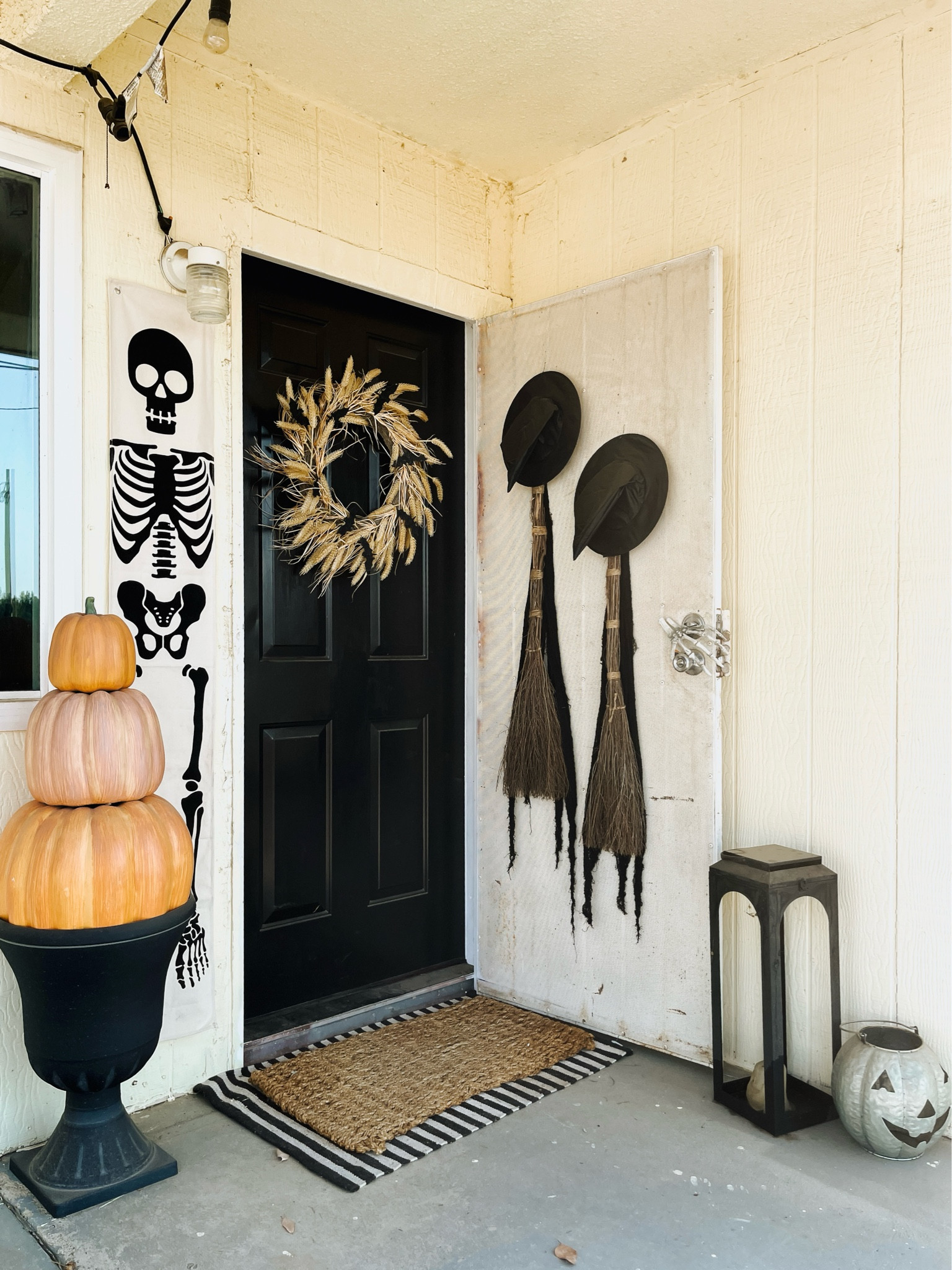 The bats on the wreath are from Dollar Tree! You can get a pack of 4 for $1.25 and they come in orange, black, silver, or purple. I used a total of 2 packs and just clipped them onto the wreath so no glueing involved! The pumpkins are from Home Depot years ago and are unfortunately discontinued. The skeleton banner was in the Target dollar spot last year (2023) for $5 and unfortunately they didn’t bring them back. I got the urn planter from Joann for $29.99 in their Halloween section, but I’ve linked similar ones from Amazon. The striped mat is from Hobby Lobby, which in my opinion has the best price, and it’s a 24x36 inch mat. The lantern was a lucky find at Home Goods during their summer clearance! I didn’t realize it at the time but it’s a perfect West Elm dupe for a major fraction of the price!

Halloween Decorations, Halloween Outdoor Decorations, Halloween Front Door

#LTKHalloween #LTKSeasonal #LTKFindsUnder50