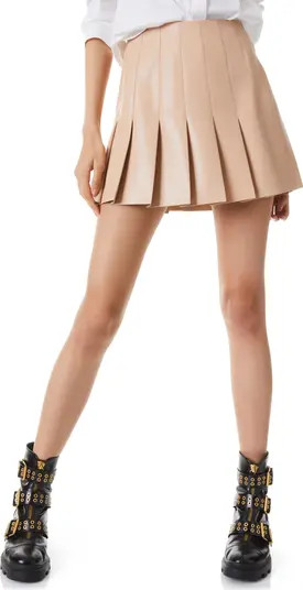Show everyone you're too cool for school in a pleated skirt made of supple faux leather.Lined100%... | Nordstrom