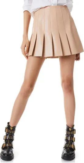 Show everyone you're too cool for school in a pleated skirt made of supple faux leather.Lined100%... | Nordstrom